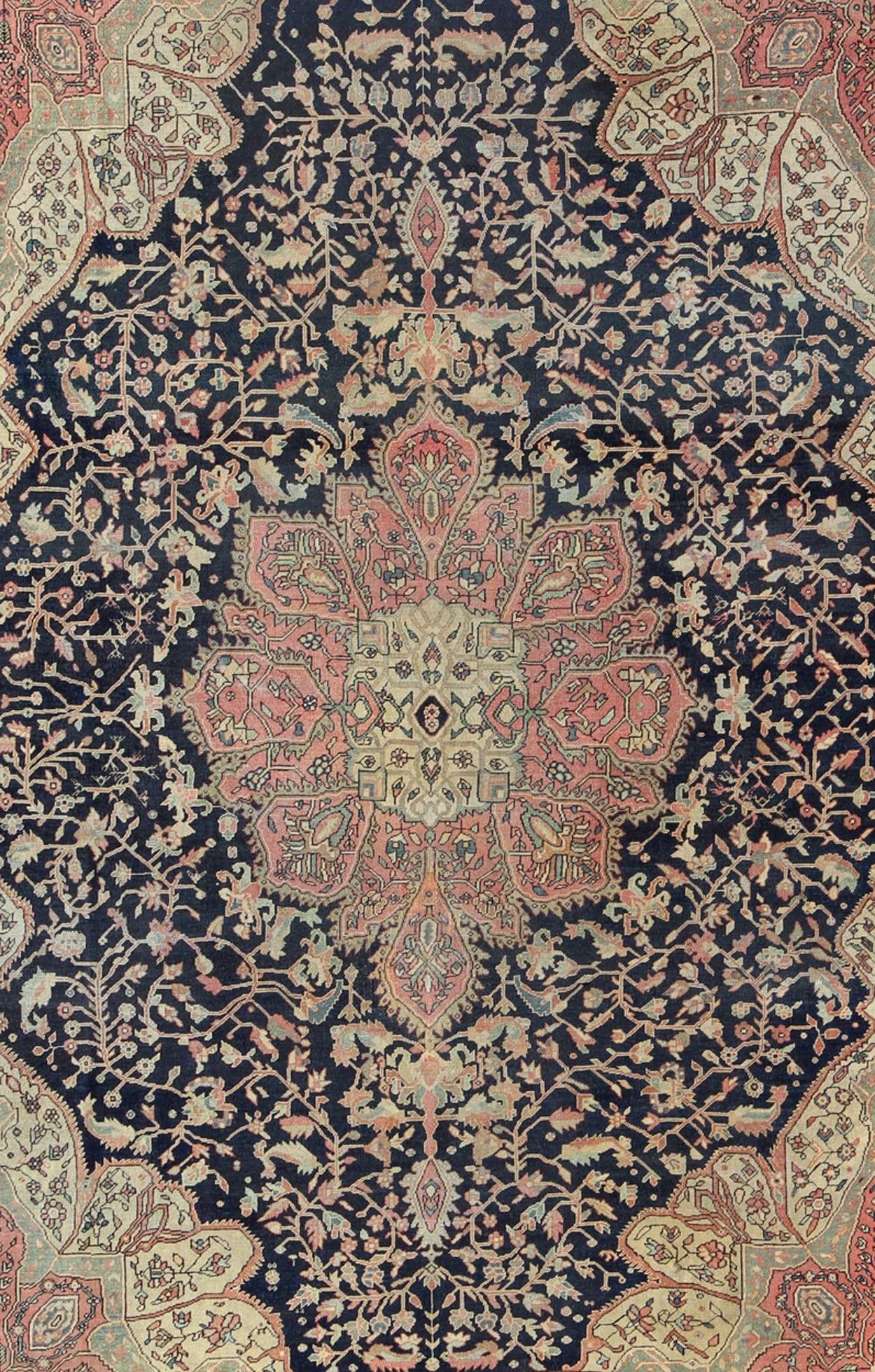 Persian Antique Sarouk Farahan with Floral Motifs in Salmon, Green, Beige and Navy Blue For Sale