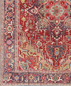 Antique Heriz Carpet with Stylized Floral Motifs and Complementary Border
