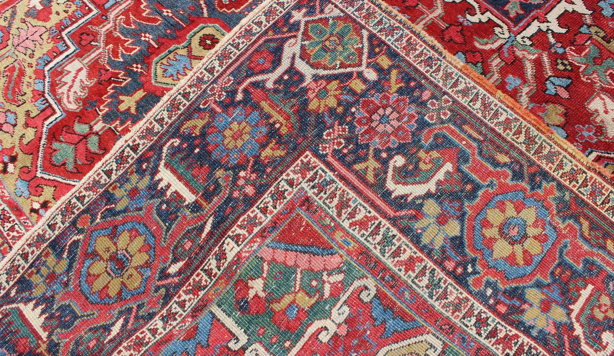 Hand-Knotted Antique Heriz Carpet with Stylized Floral Motifs and Complementary Border For Sale