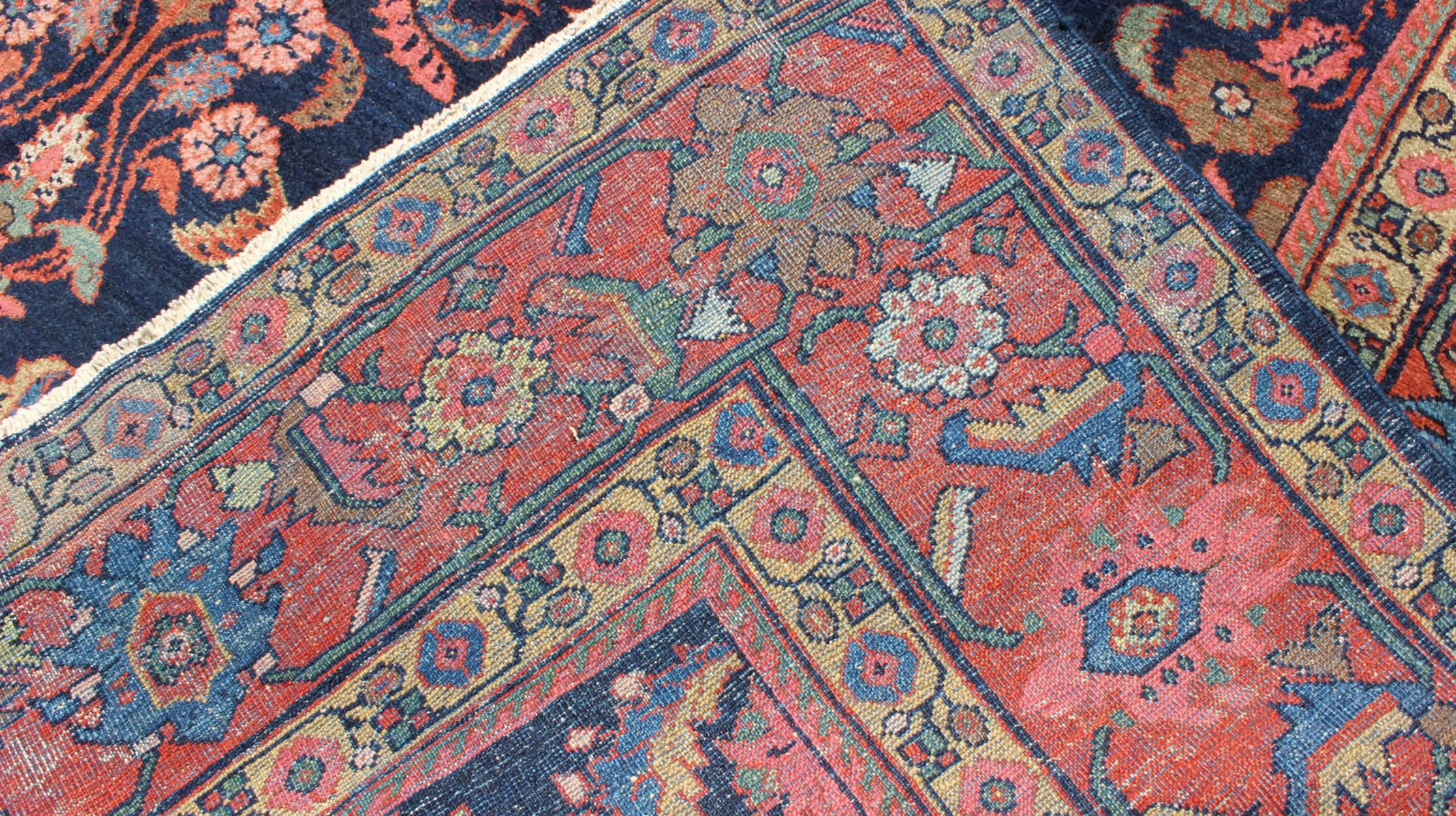 Early 20th Century  Antique Mahal Rug with Dark Blue Field & Coral Red Border with Floral Motifs For Sale