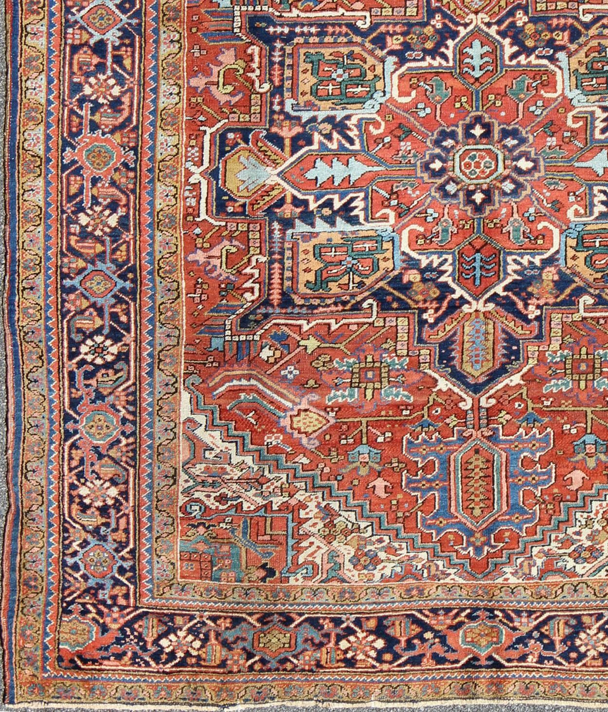  Antique Colorful Persian Heriz Rug with Geometric Patterns and Intricate Design. Keivan Woven Arts / rug D-0927, country of origin / type: Iran / Heriz, Heriz-Serapi , circa 1920  

 Measures: 8'3 x 10'4                                 

This