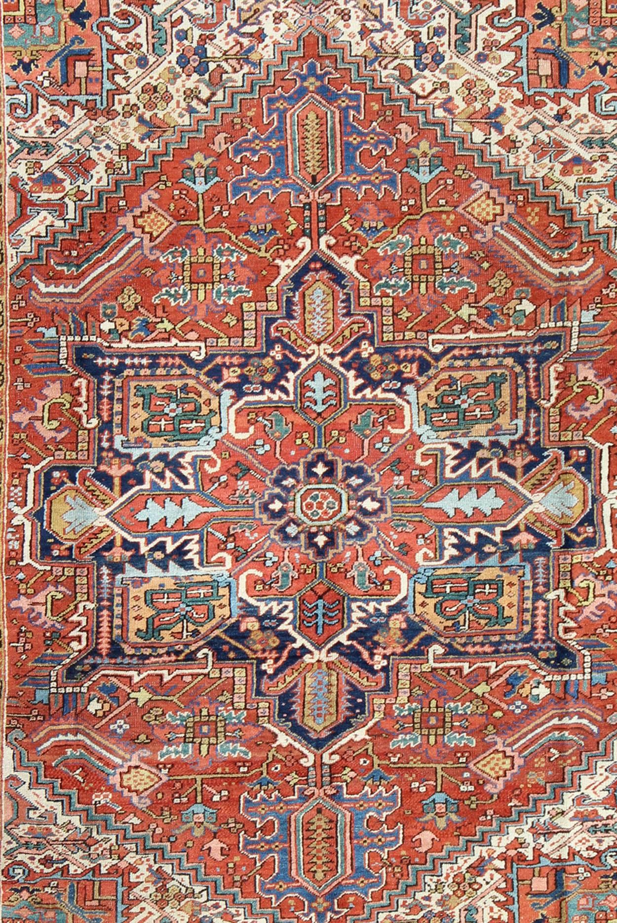 Heriz Serapi Antique Colorful Persian Heriz Rug with Geometric Patterns and Intricate Design For Sale