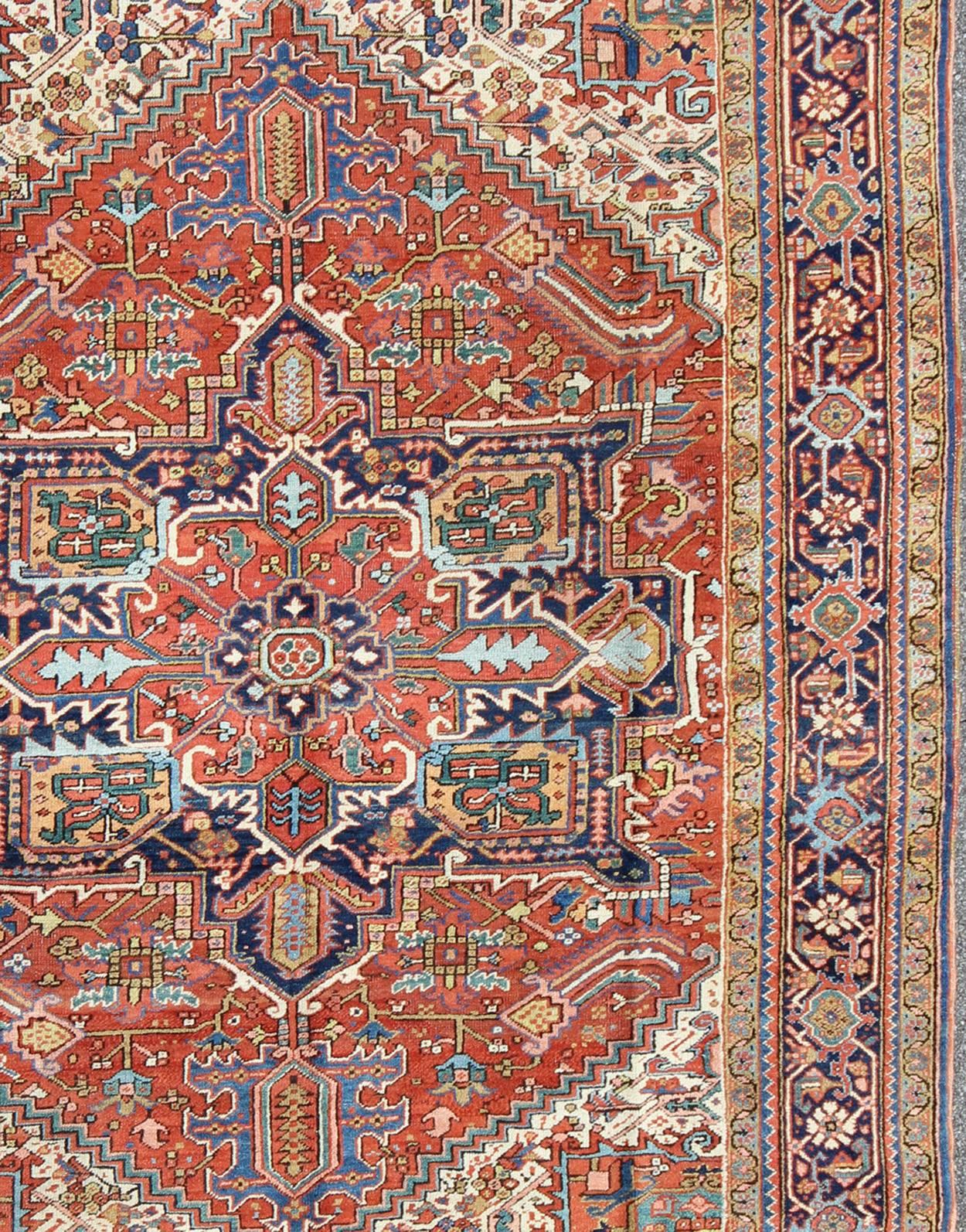 Hand-Knotted Antique Colorful Persian Heriz Rug with Geometric Patterns and Intricate Design For Sale