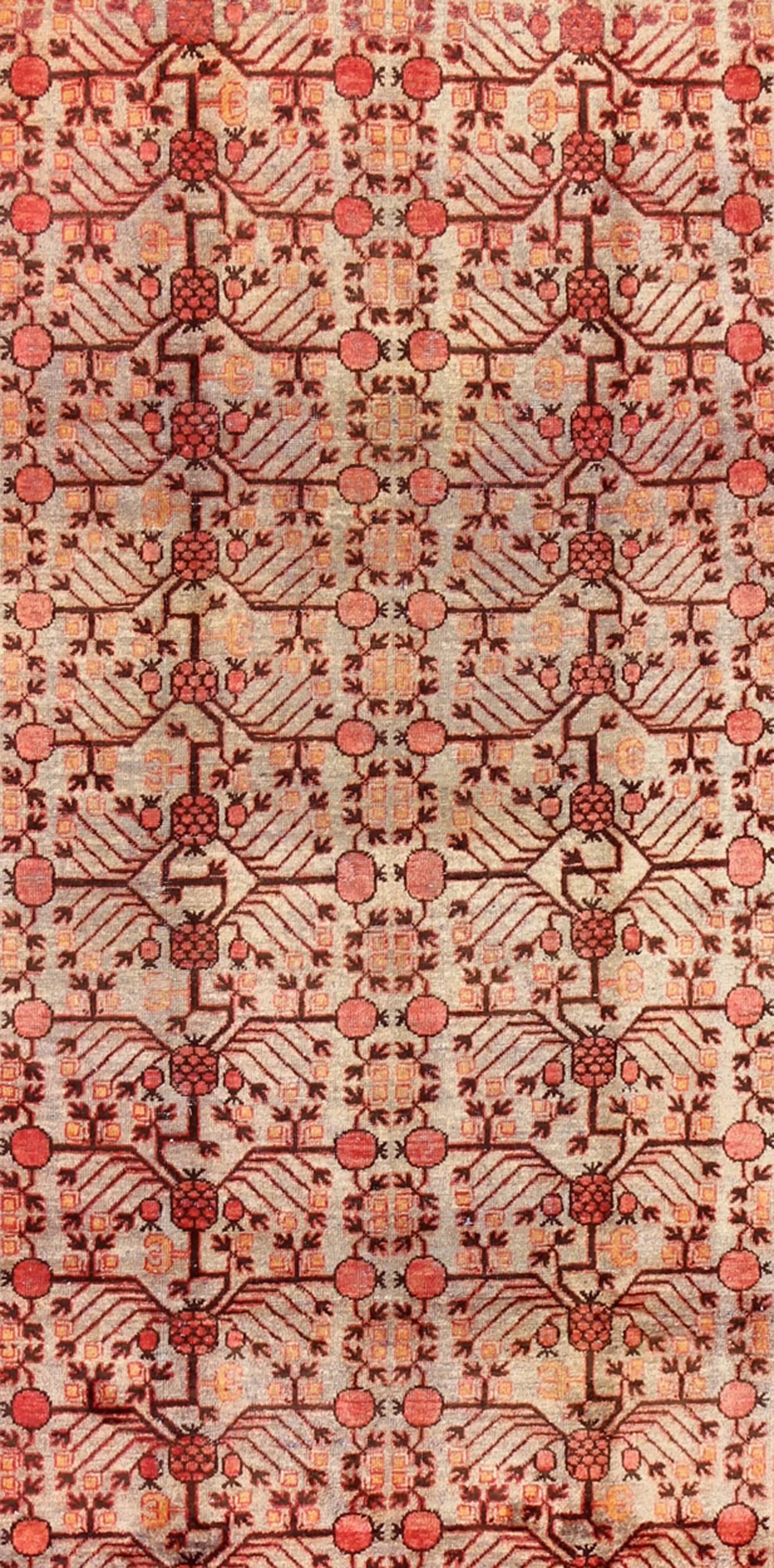 Turkmen Large Khotan Antique Rug with Pomegranate Design in Taupe, Green, Red and Brown For Sale