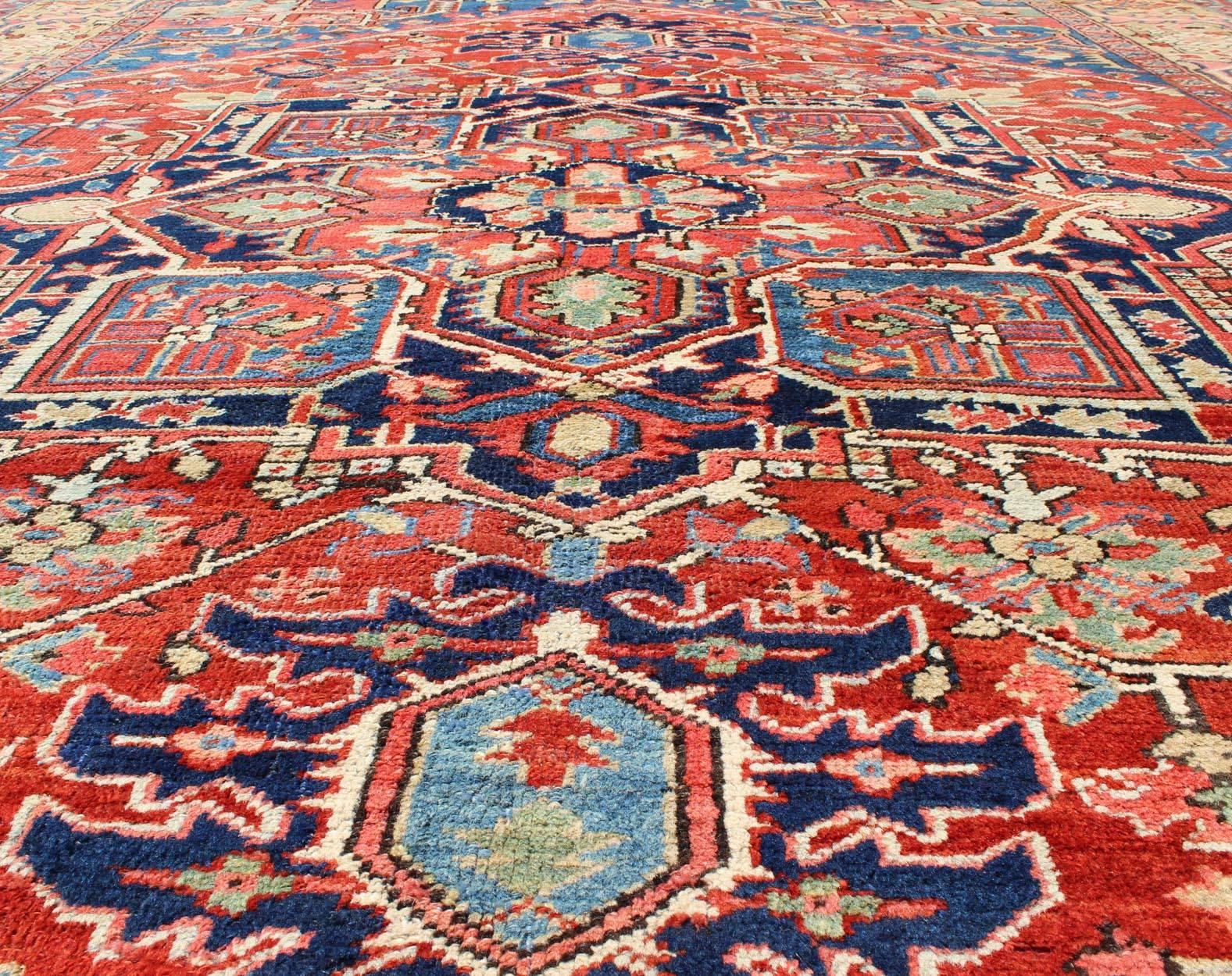 Wool Antique Persian Serapi Rug with Geometric Central Medallion and Colorful Design For Sale