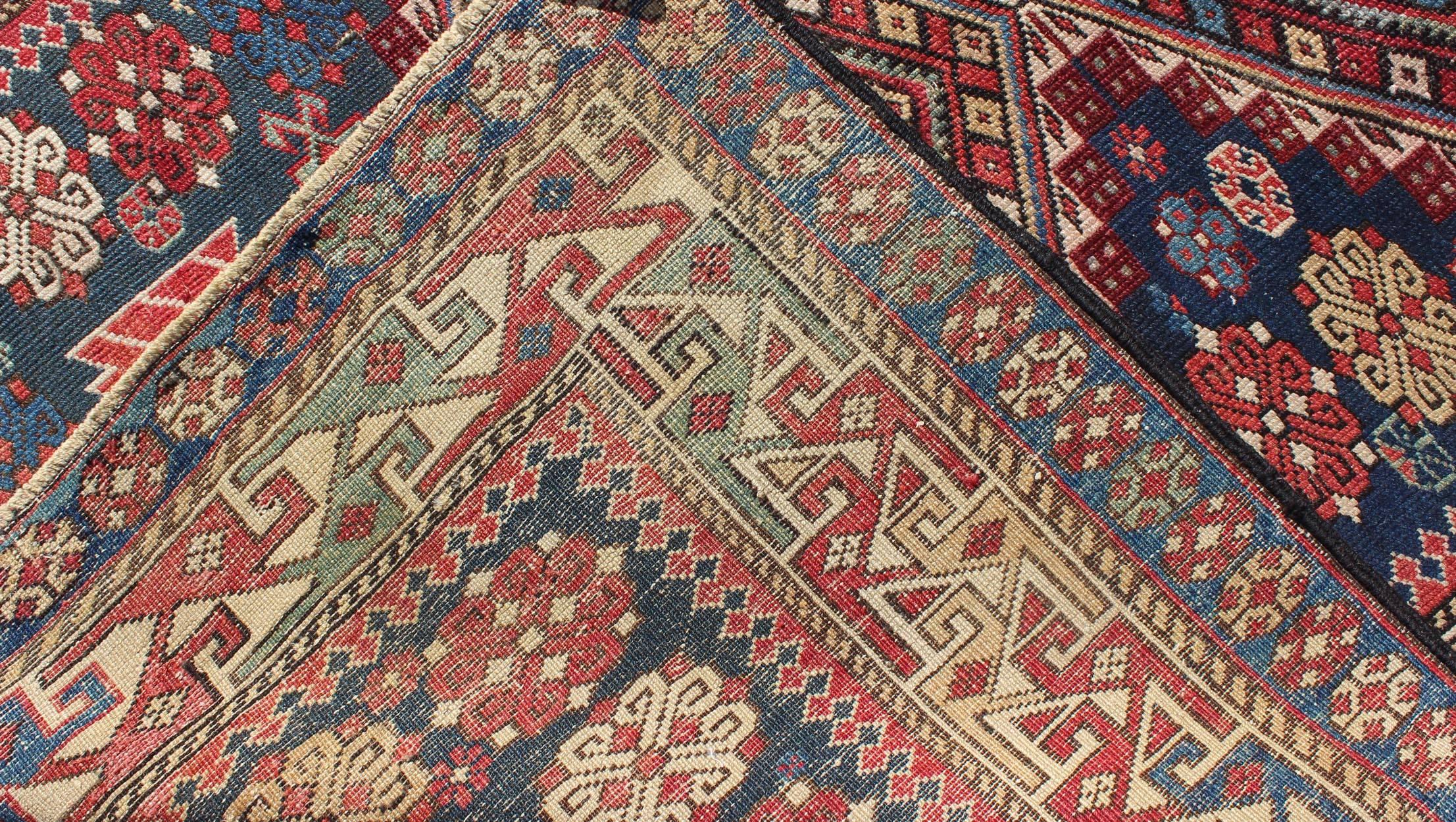 Late 19th Century Antique Kazak Rug with in Multi Colors and Indigo Background For Sale