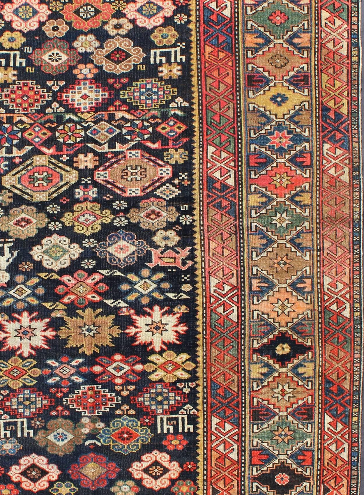 Kazak Colorful Antique Kuba Carpet with Intricate Geometric Design For Sale