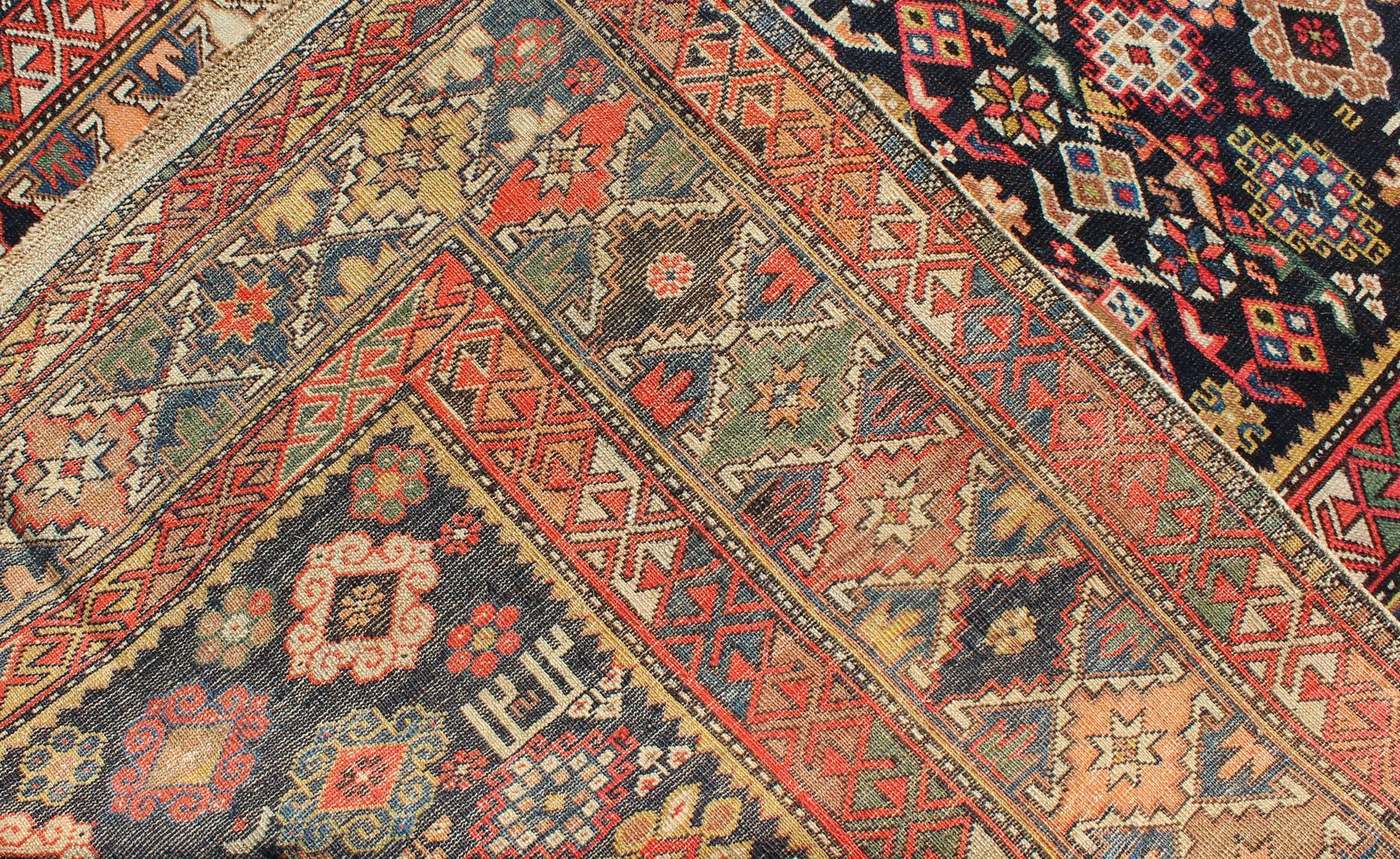 Hand-Knotted Colorful Antique Kuba Carpet with Intricate Geometric Design For Sale