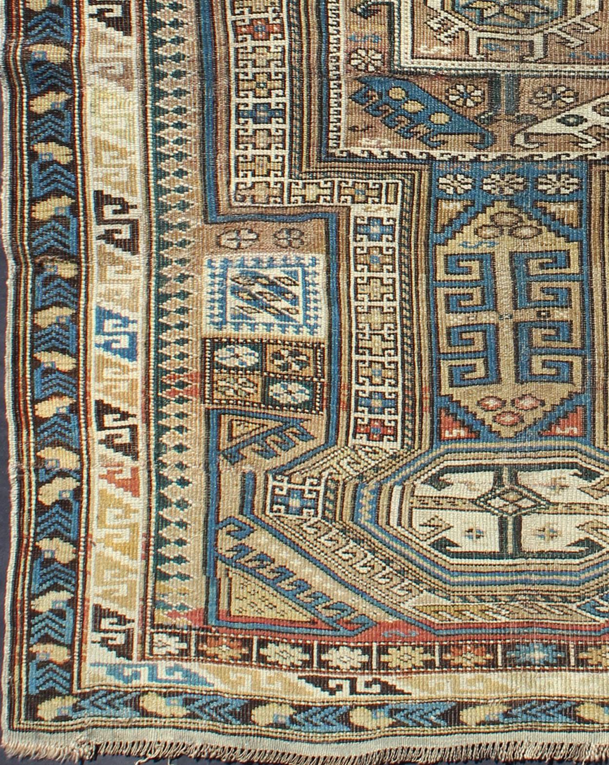 Antique Caucasian Kazak Rug with Geometric Star, Cross and Greek Key Motifs.
This stunning late 19th century Kazak rug from the Caucasus region displays magnificent, interconnected, geometric medallions and an all-over geometric design. A dynamic