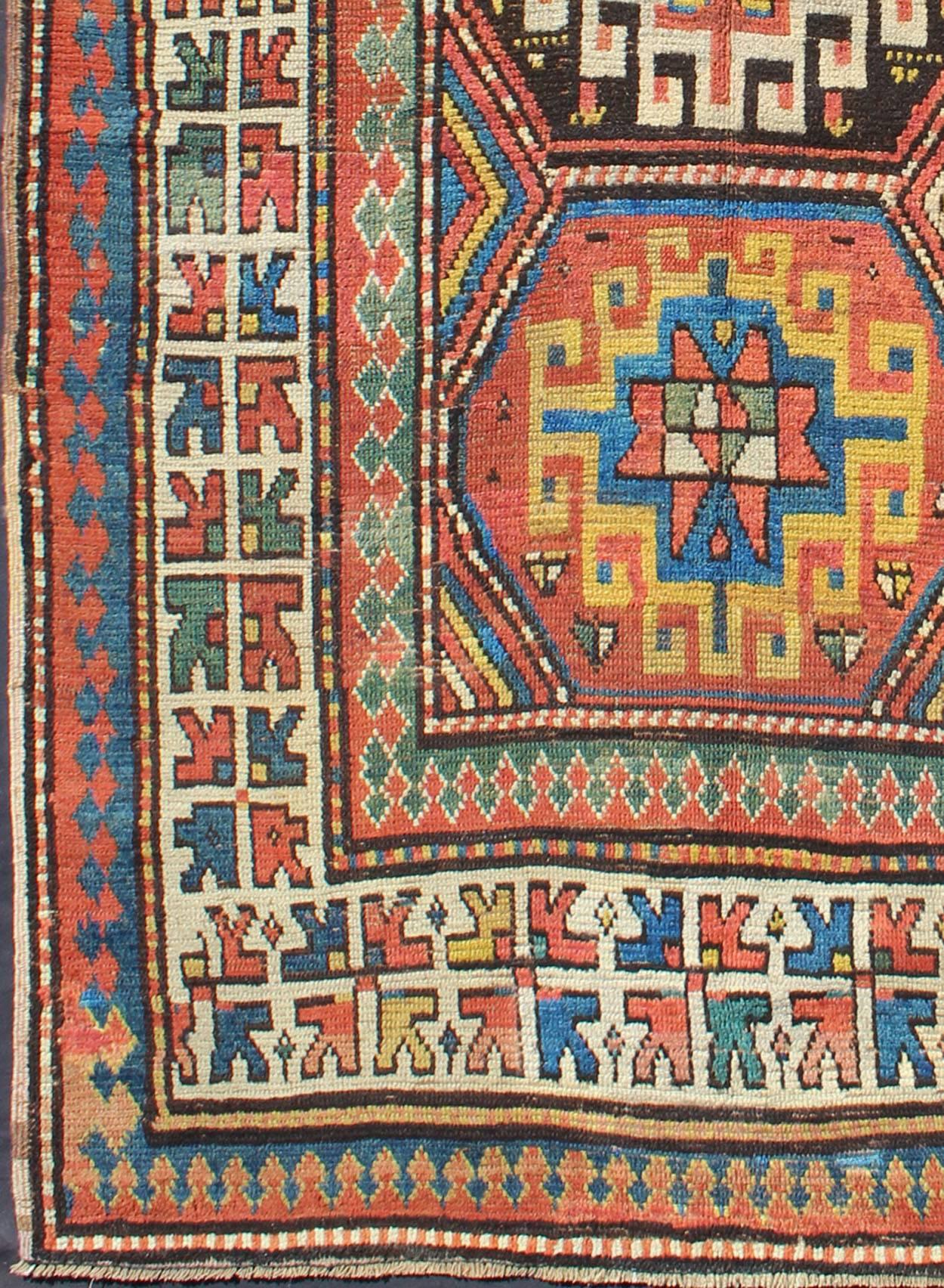 Late 19th Century Antique Kazak Carpet with Colorful Geometric Design. Keivan Woven Arts / rug KBE-16, country of origin / type: Caucus / Caucasian, circa 1880.
Measures: 3'8 x 6'3.
This stunning late 19th century Kazak rug from the Caucasus region