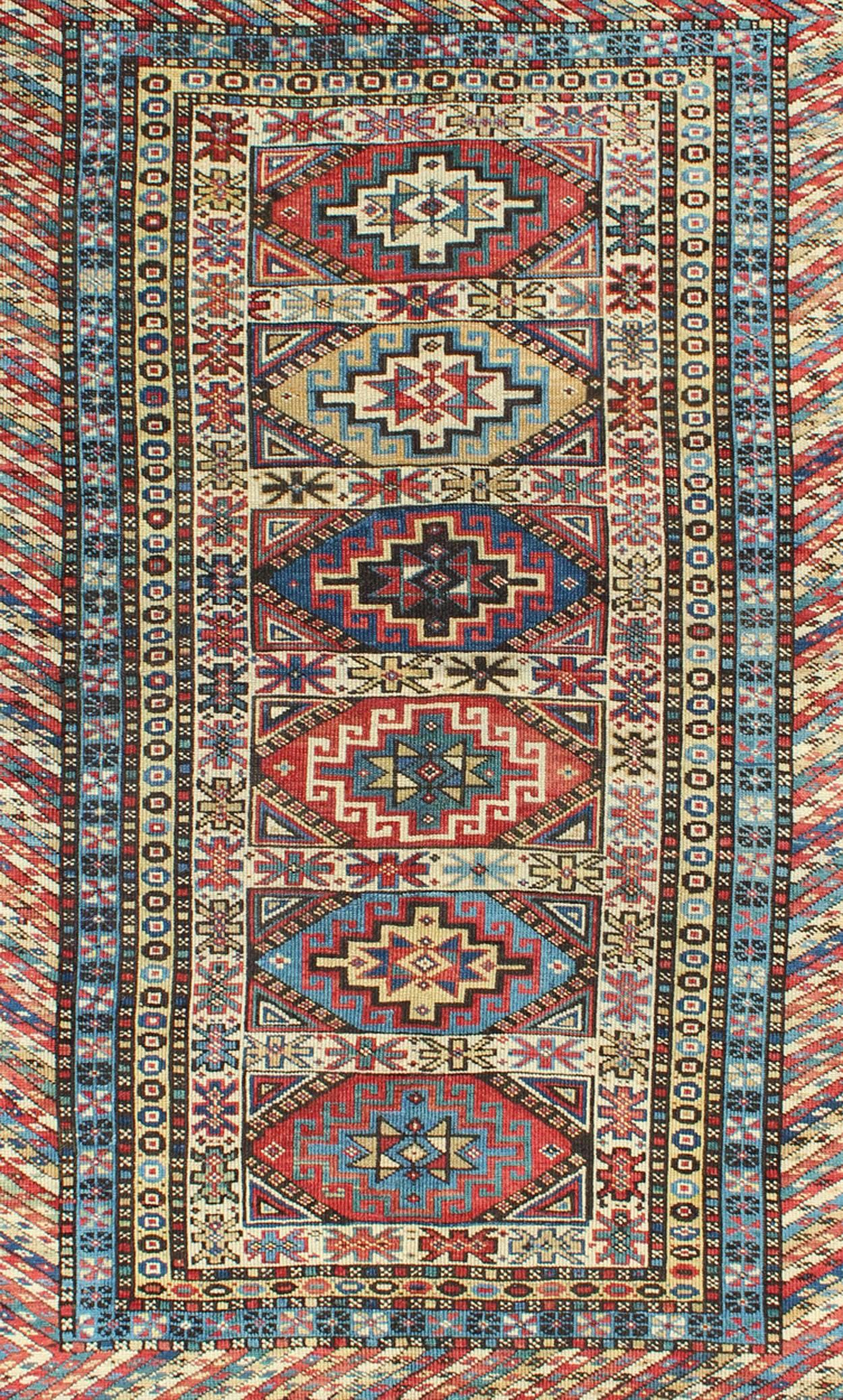 Kazakh Tapis caucasien ancien avec six médaillons centraux et bordures géométriques complexes en vente