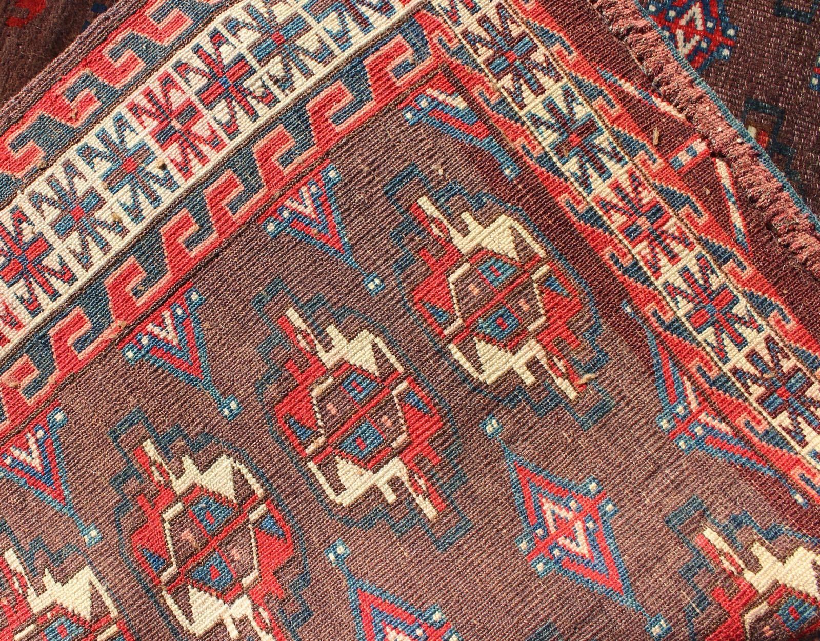 19th Century Antique Tekke Rug with Brown Field and Tribal Motifs in Red In Good Condition For Sale In Atlanta, GA