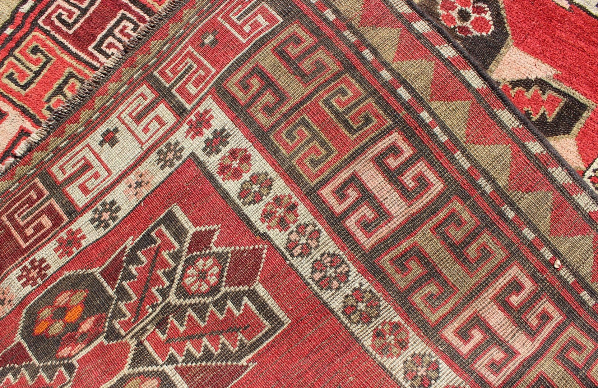 Antique Kazak Runner with Medallions and Tribal Design in Red Background  In Good Condition For Sale In Atlanta, GA