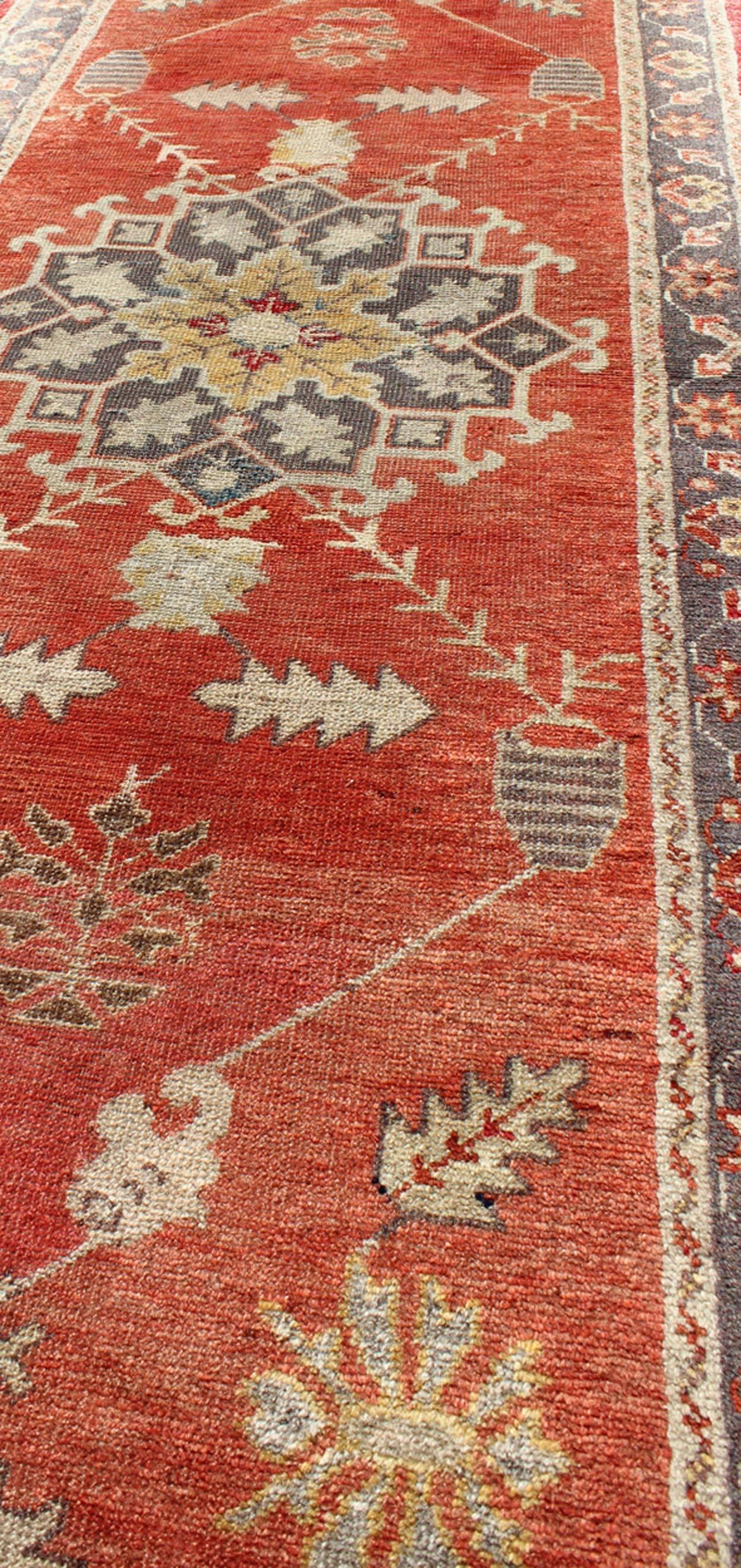 20th Century Red and Gray Mid-Century Vintage Turkish Oushak Runner with Floral Medallions For Sale