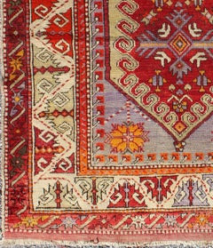 Colorful Early 20th Century Antique Turkish Oushak Rug with Medallion in Purple