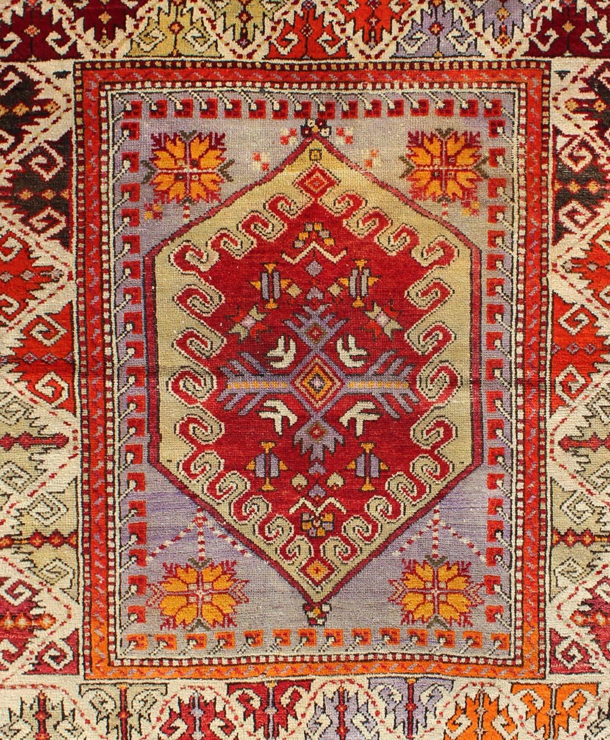 Hand-Knotted Colorful Early 20th Century Antique Turkish Oushak Rug with Medallion in Purple For Sale