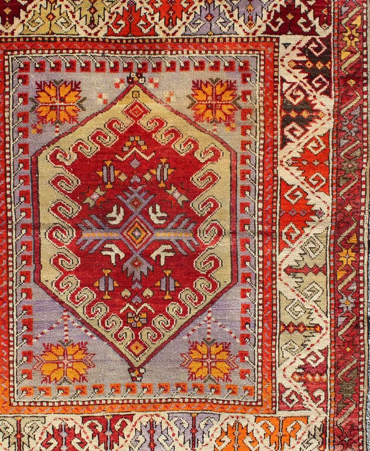 Colorful Early 20th Century Antique Turkish Oushak Rug with Medallion in Purple In Excellent Condition For Sale In Atlanta, GA