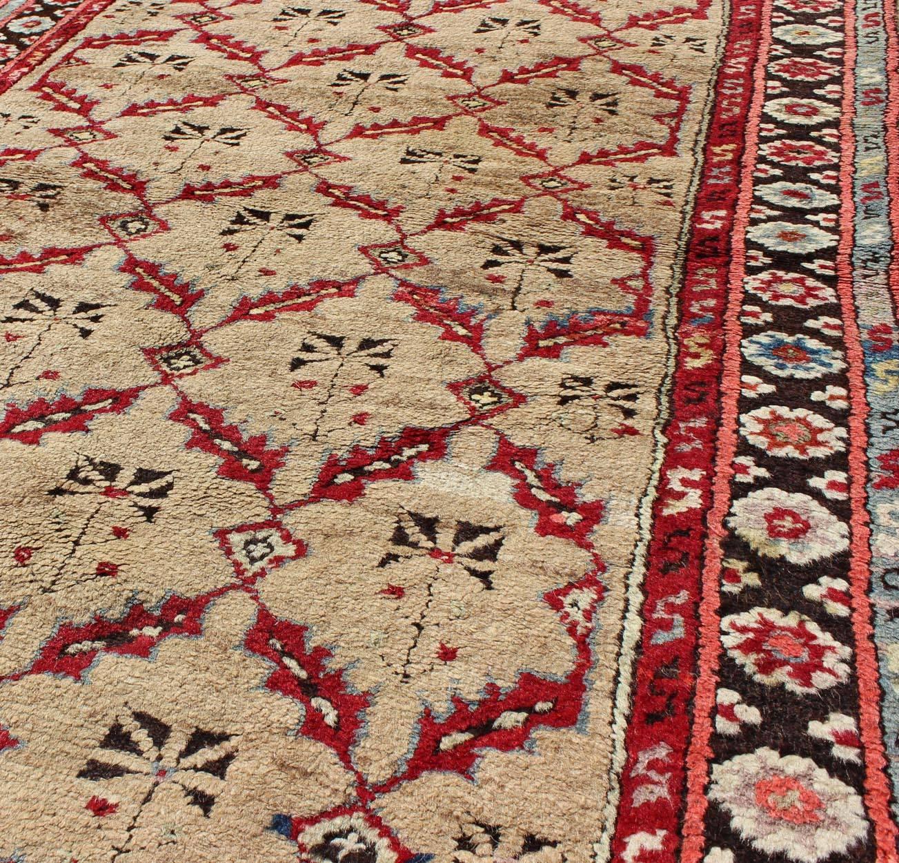 Antique 1930's Turkish Oushak Rug with All-Over Lattice & Geometric Design In Good Condition For Sale In Atlanta, GA