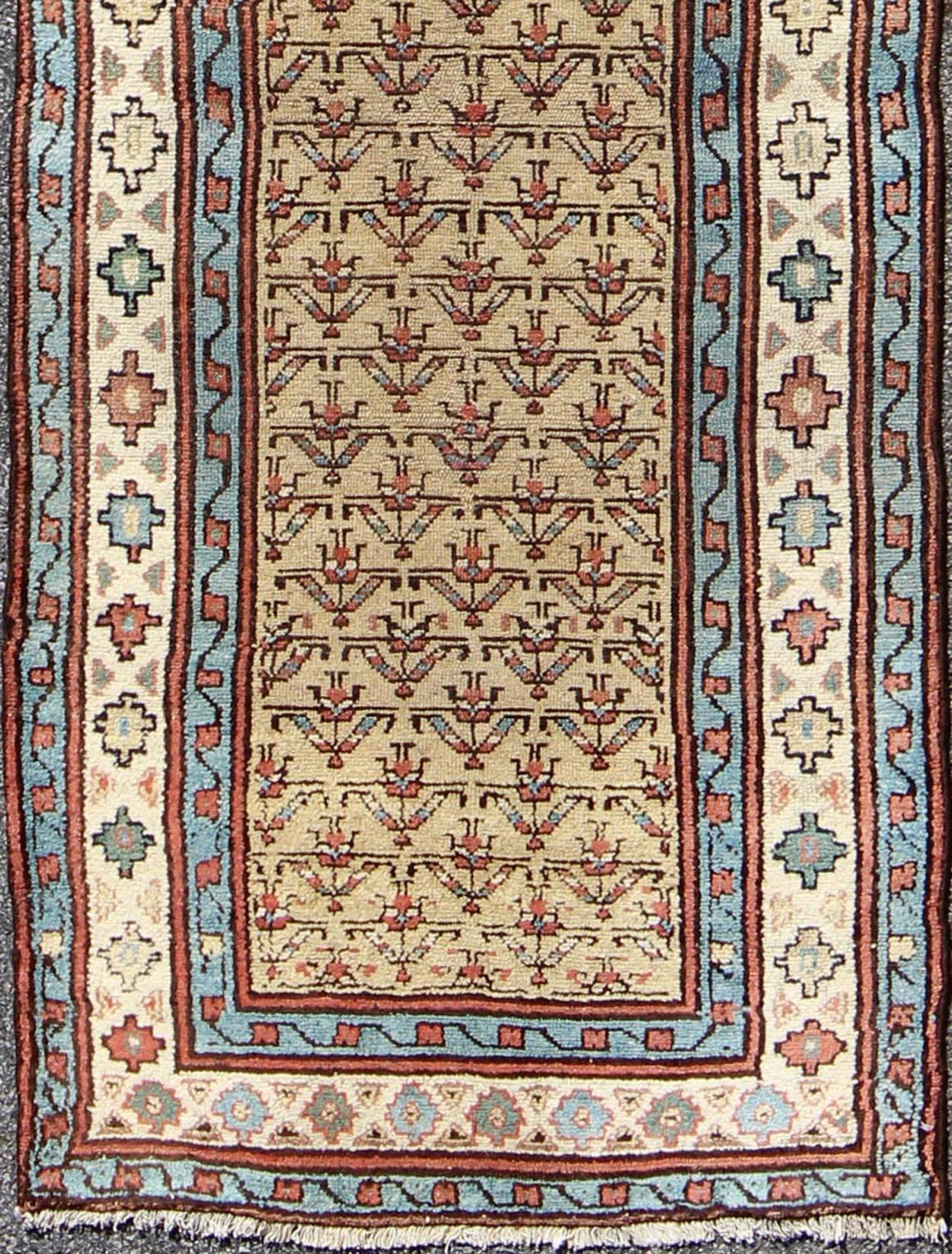 Early 20th century tribal antique Serab runner with all-over pattern in wheat, rug l11-0913, country of origin / type: Iran / Tribal, circa 1900

This unique antique Serab runner from early 20th century Iran features a wheat-colored field and