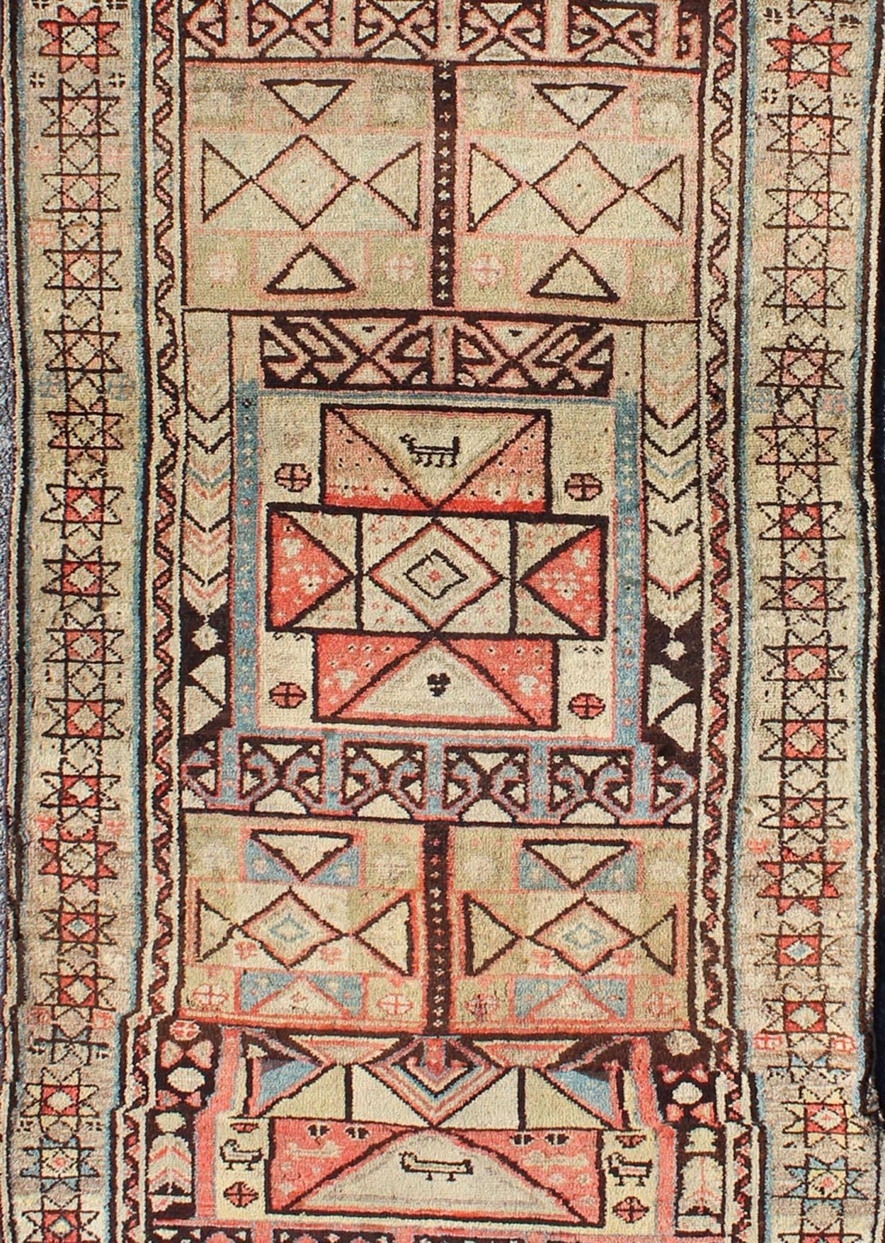 Early 20th century tribal antique Serab runner with colorful geometric pattern, rug l11-0914, country of origin / type: Iran / tribal, circa 1900

The stirring composition of this exemplary runner is characterized by a tribal geometric pattern and
