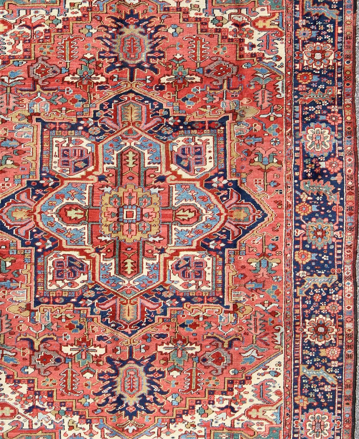 Hand-Knotted Early 20th Century Antique Persian Heriz with Geometric Medallion and Patterns