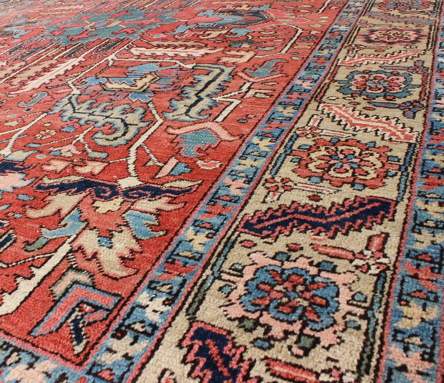 Hand-Knotted Antique All Over Serapi Goravan Rug in Soft Red, Yellow, L. Blue & L. Green For Sale