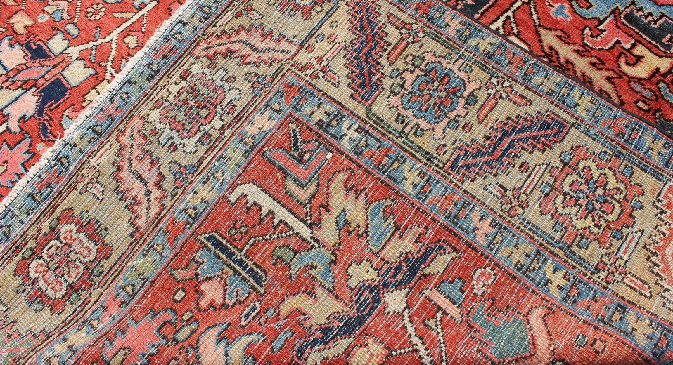 Early 20th Century Antique All Over Serapi Goravan Rug in Soft Red, Yellow, L. Blue & L. Green For Sale