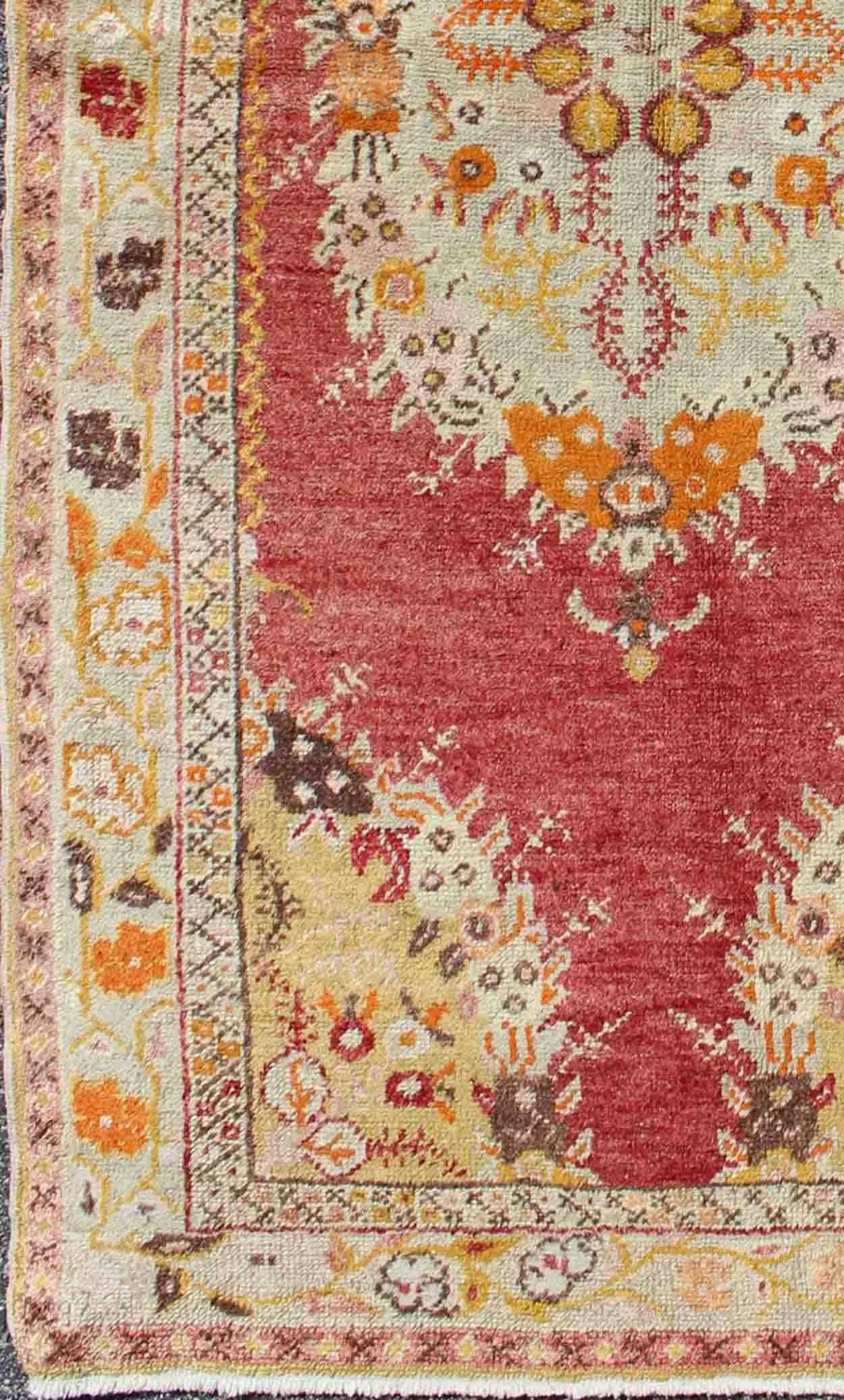 1940s Vintage Turkish Oushak with floral central medallion and flower cornices, Keivan Woven Arts/ rug M14-0807, country of origin / type: Turkey / Oushak, circa 1940.

Measures: 3 x 6'4

This Vintage Turkish Oushak carpet (circa 1930) features a