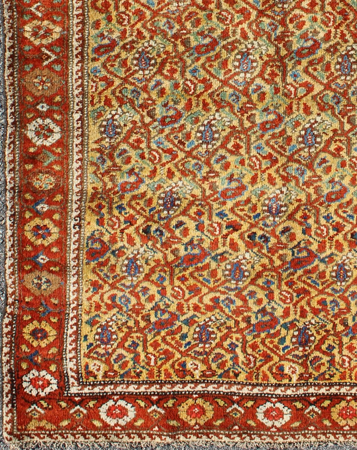 Unique antique Serab rug with Saffron Yellow background and Leaf / paisley pattern, rug M14-1005, country of origin / type: Iran / Tabriz, circa 1900

This all-over Persian Serab carpet (circa 1920) has a cream / yellow background and a red border.