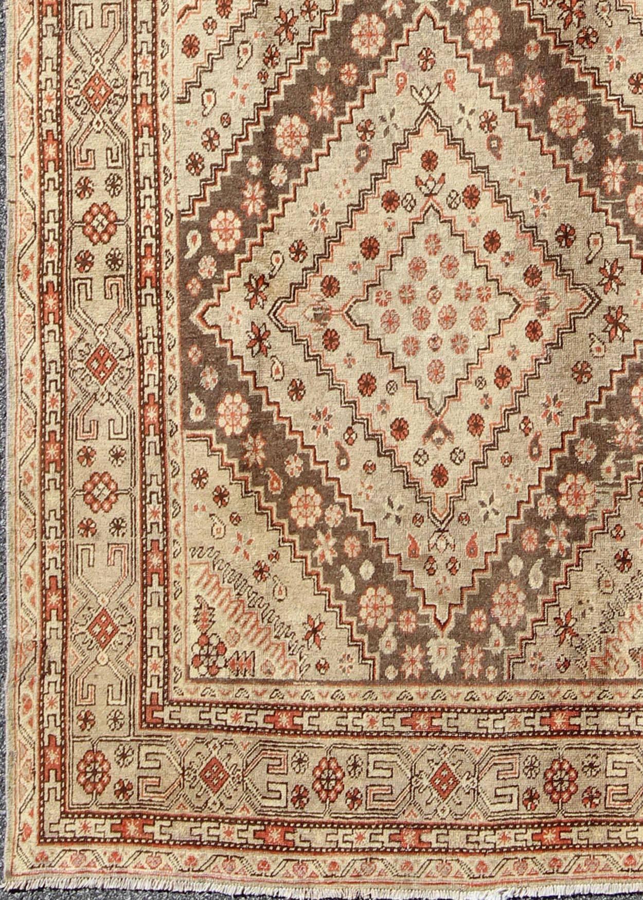 Early 20th century antique Khotan rug with paired diamond medallions, rug mp-39e, country of origin / type: Turkey / Khotan, circa 1920

This delicately rendered antique Khotan rug was handcrafted in Turkestan during the early part of 20th century