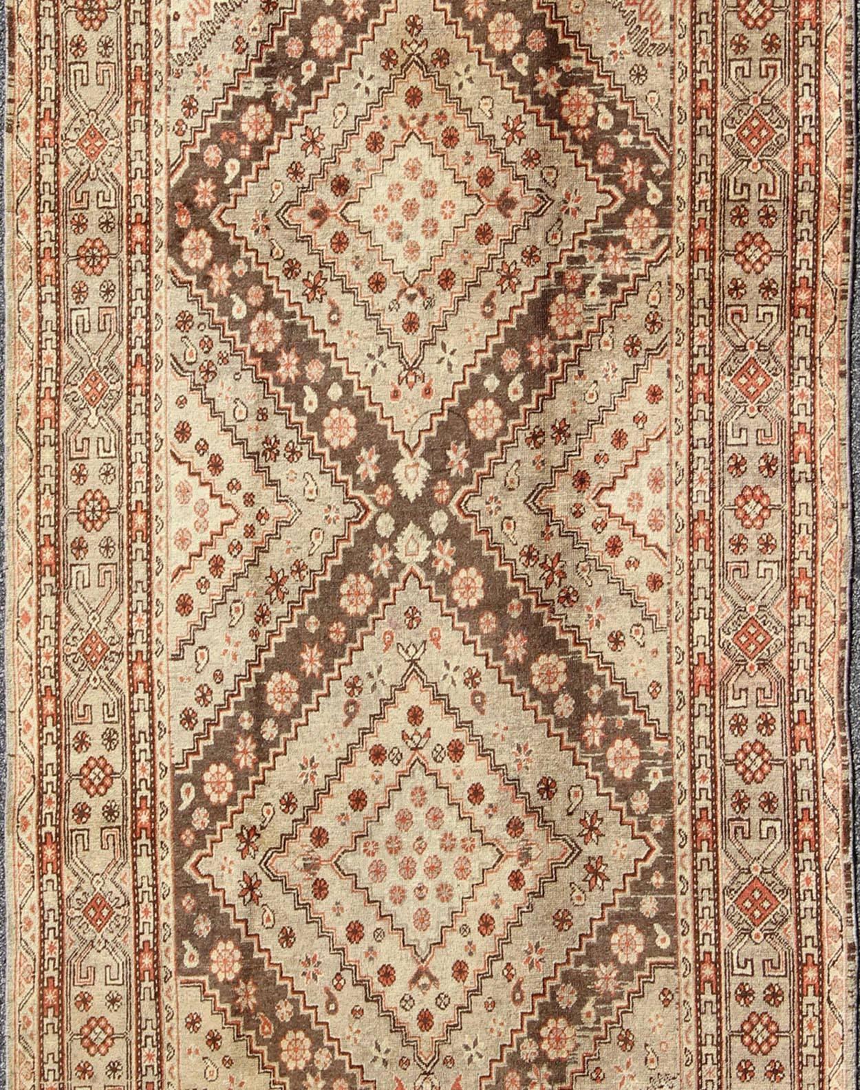 Turkish Early 20th Century Antique Khotan Rug with Paired Diamond Medallions in Brown For Sale