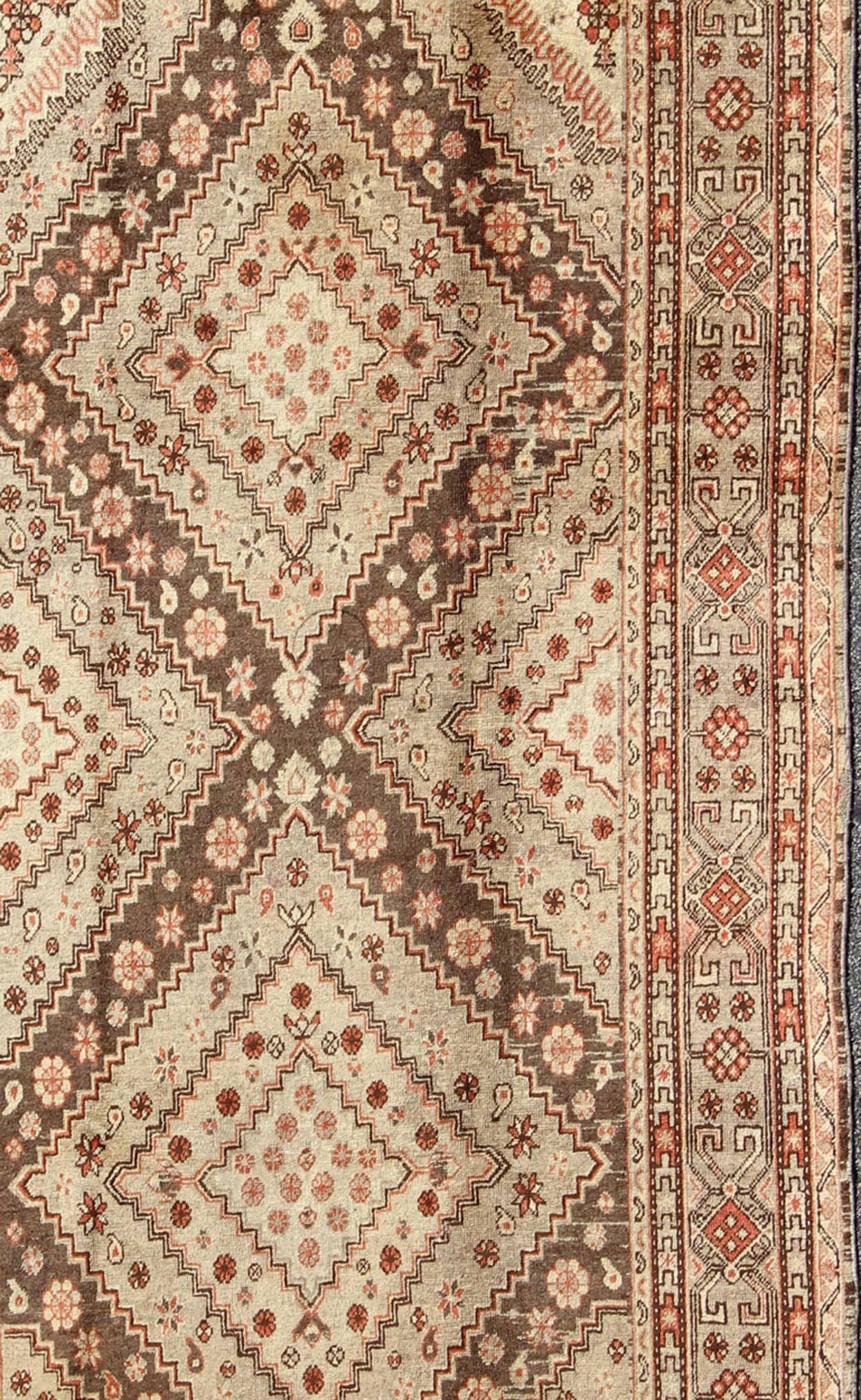 Hand-Knotted Early 20th Century Antique Khotan Rug with Paired Diamond Medallions in Brown For Sale