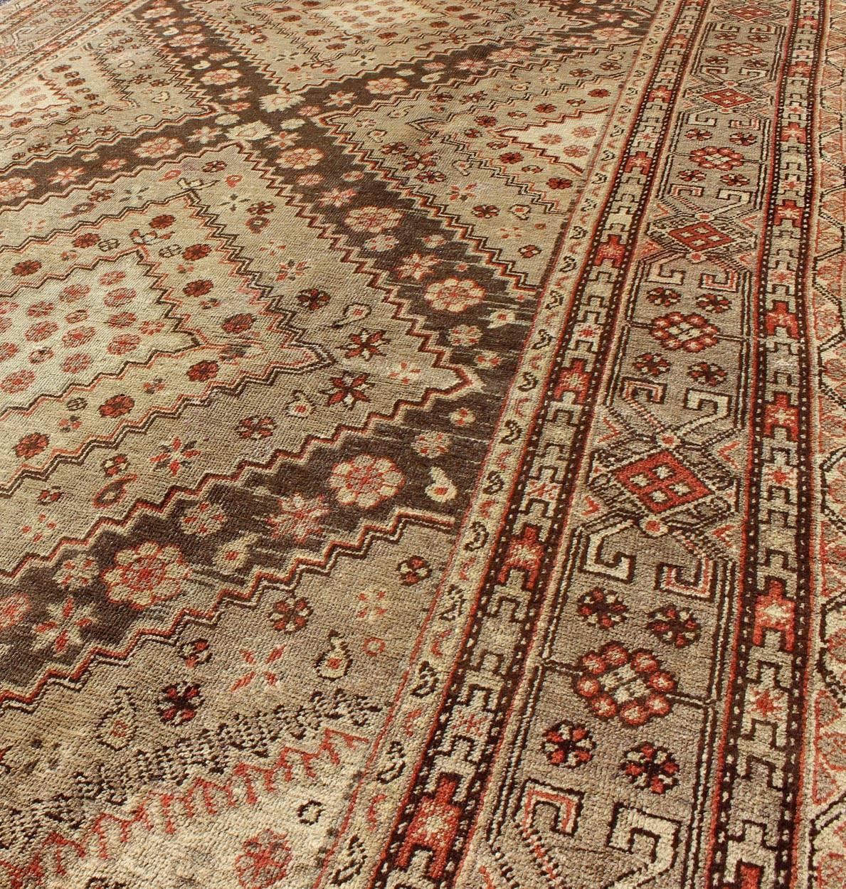 Early 20th Century Antique Khotan Rug with Paired Diamond Medallions in Brown In Good Condition For Sale In Atlanta, GA