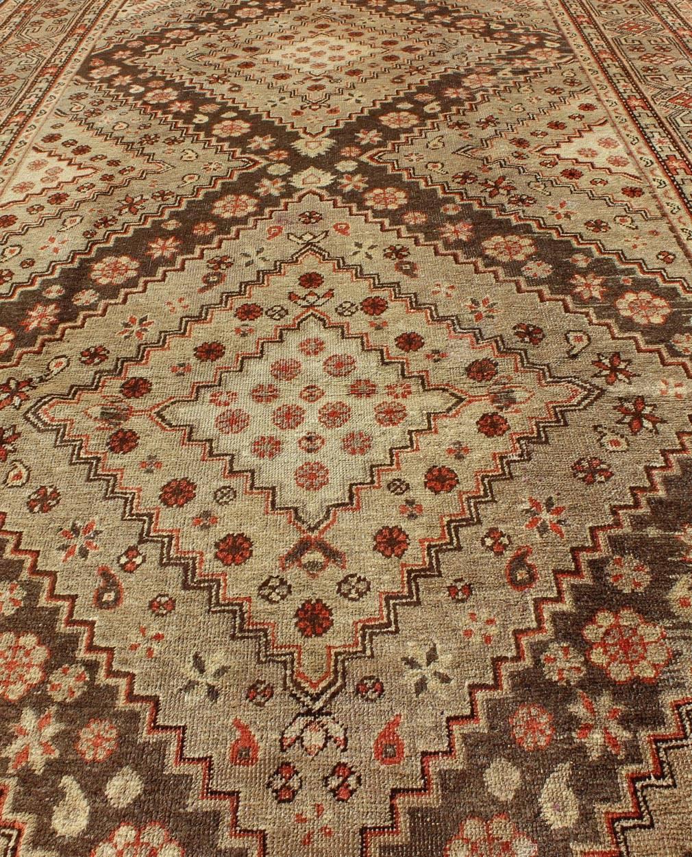 Wool Early 20th Century Antique Khotan Rug with Paired Diamond Medallions in Brown For Sale