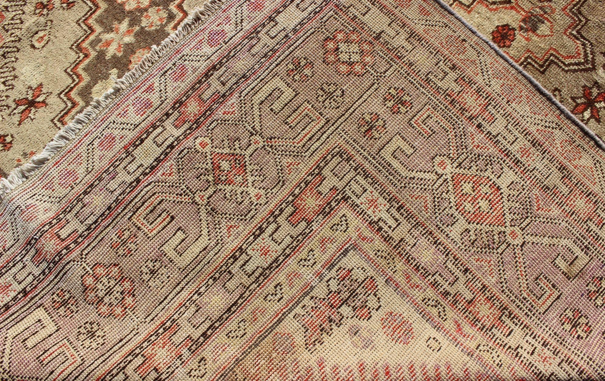 Early 20th Century Antique Khotan Rug with Paired Diamond Medallions in Brown For Sale 1