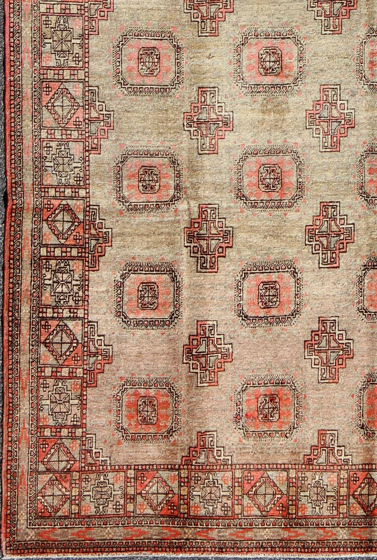 Early 20th century antique Khotan rug with all-over geometric blossom design, rug mp-1301-214, country of origin / type: East Turkestan / Khotan, circa 1920

This attractive antique Khotan rug (circa 1920) is a spectacular testament to the