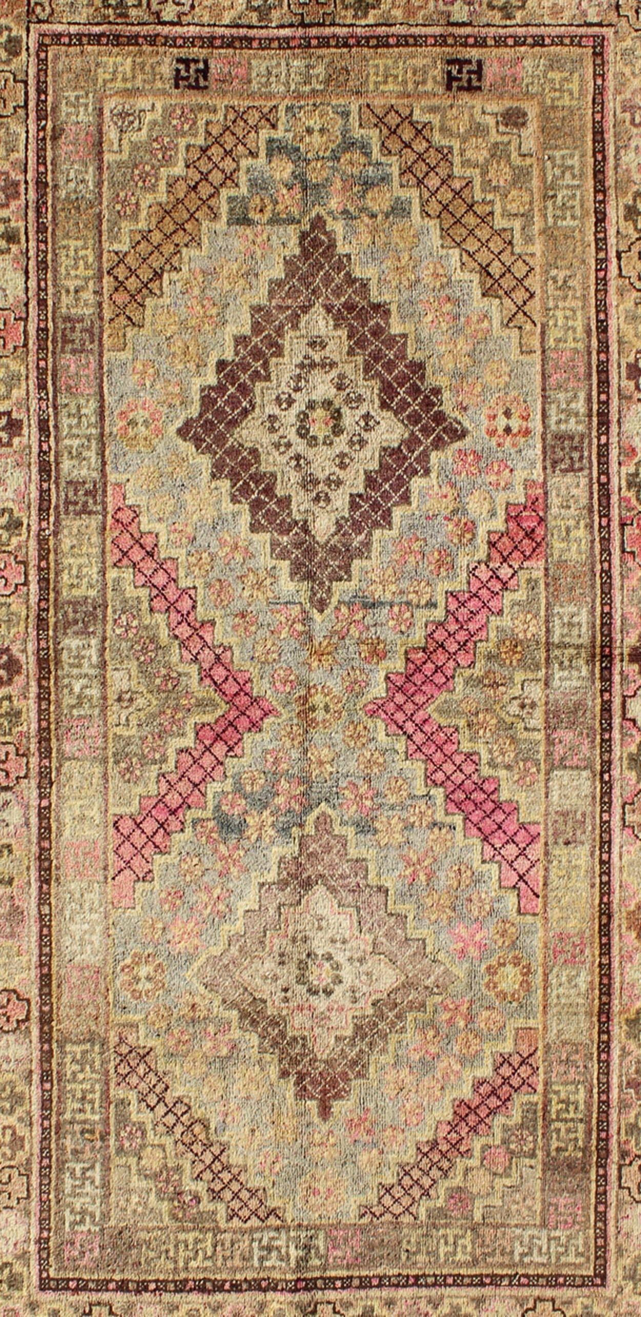 East Turkestani Early 20th Century Antique Khotan Rug with Paired Diamond Medallions in Wine Red For Sale