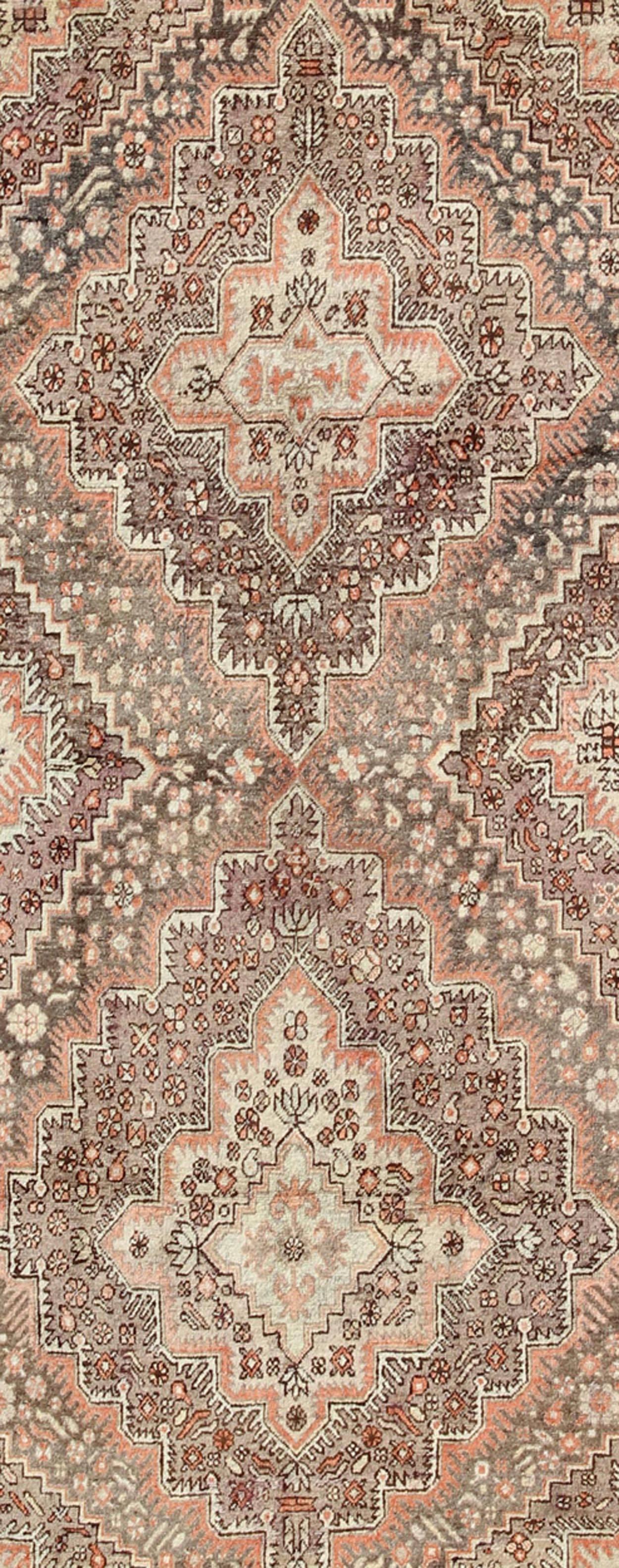 East Turkestani Early 20th Century Antique Khotan Rug with Paired Medallions in Gray and Red For Sale