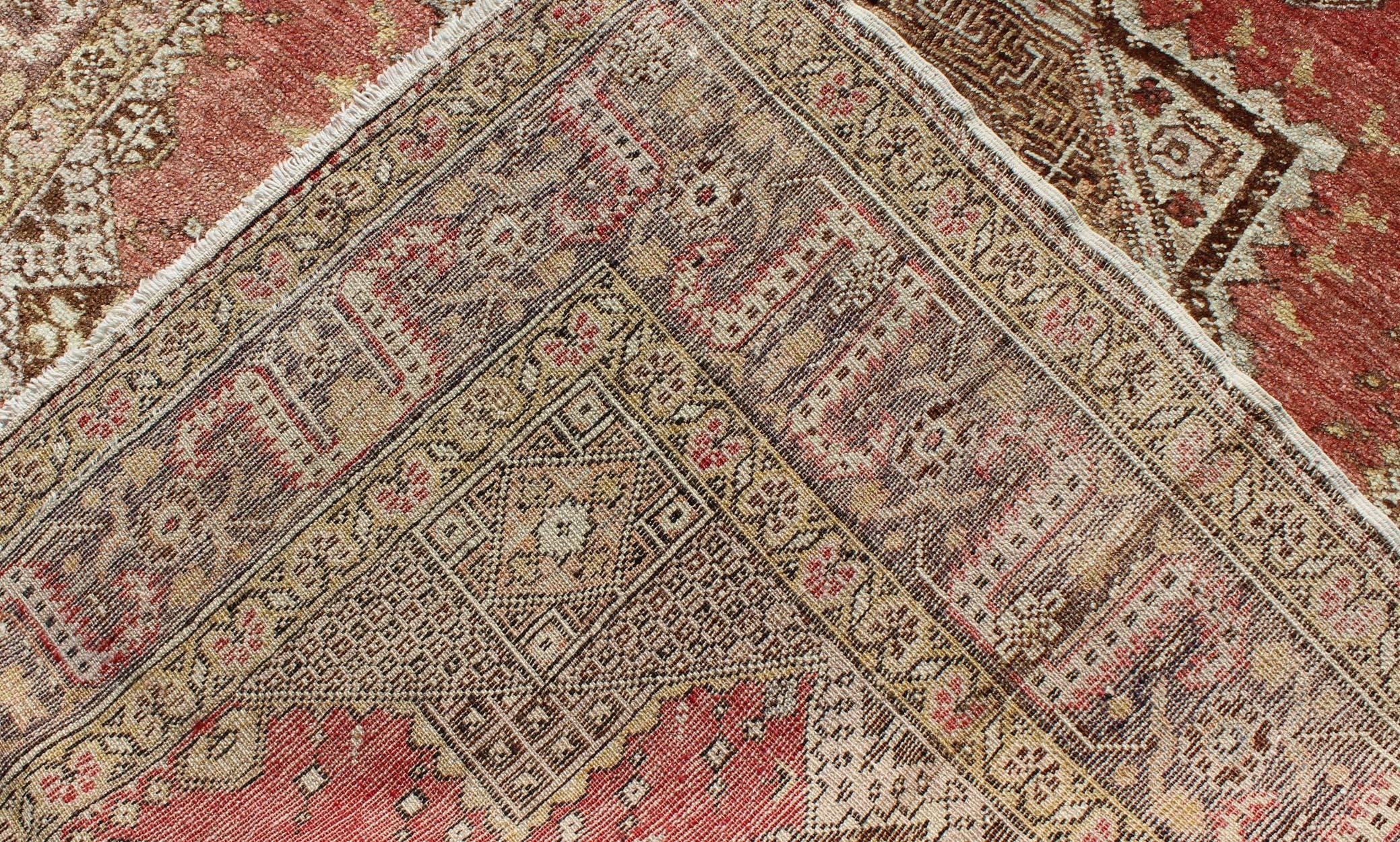 Wool Vintage Turkish Oushak Rug with Geometric Star Medallion in Red, Ivory and Taupe For Sale