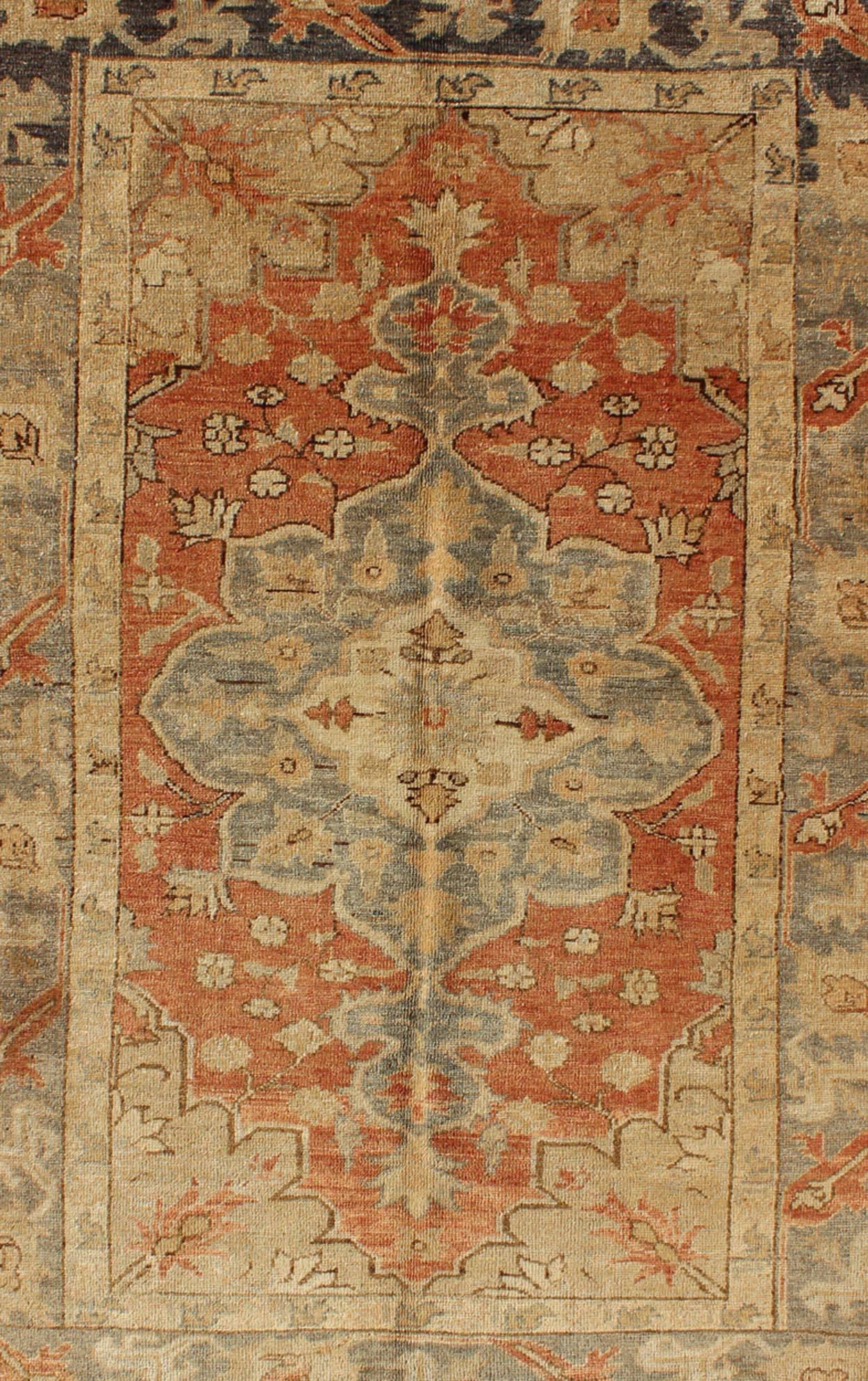Hand-Knotted Antique Turkish Oushak Rug with Floral Motifs in Soft Orange, Grey and Taupe For Sale