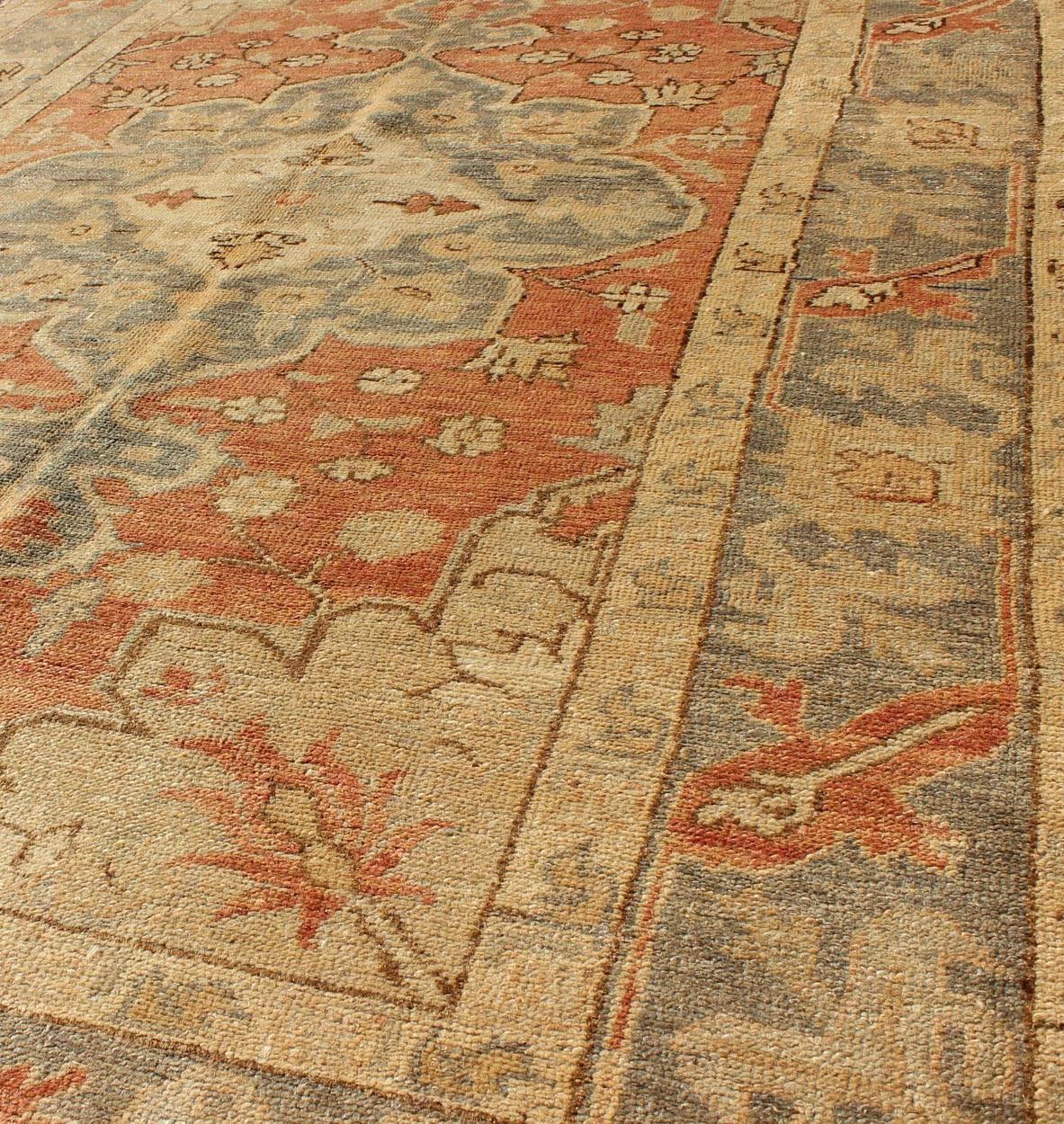 20th Century Antique Turkish Oushak Rug with Floral Motifs in Soft Orange, Grey and Taupe For Sale