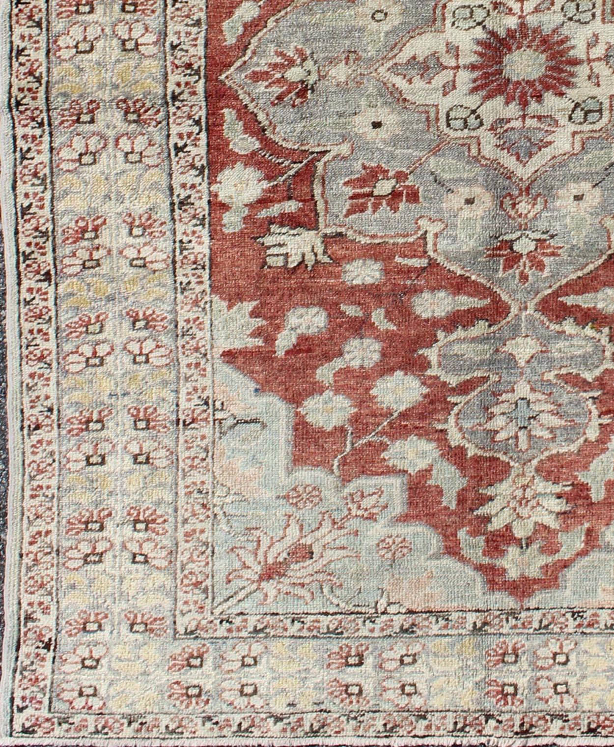 vintage Turkish Sivas rug with floral medallion in red, light blue and gray with yellow green border , rug na-54734, country of origin / type: Turkey / Sivas, circa mid-20th century

This vintage Turkish finely woven Sivas carpet (2nd quarter of