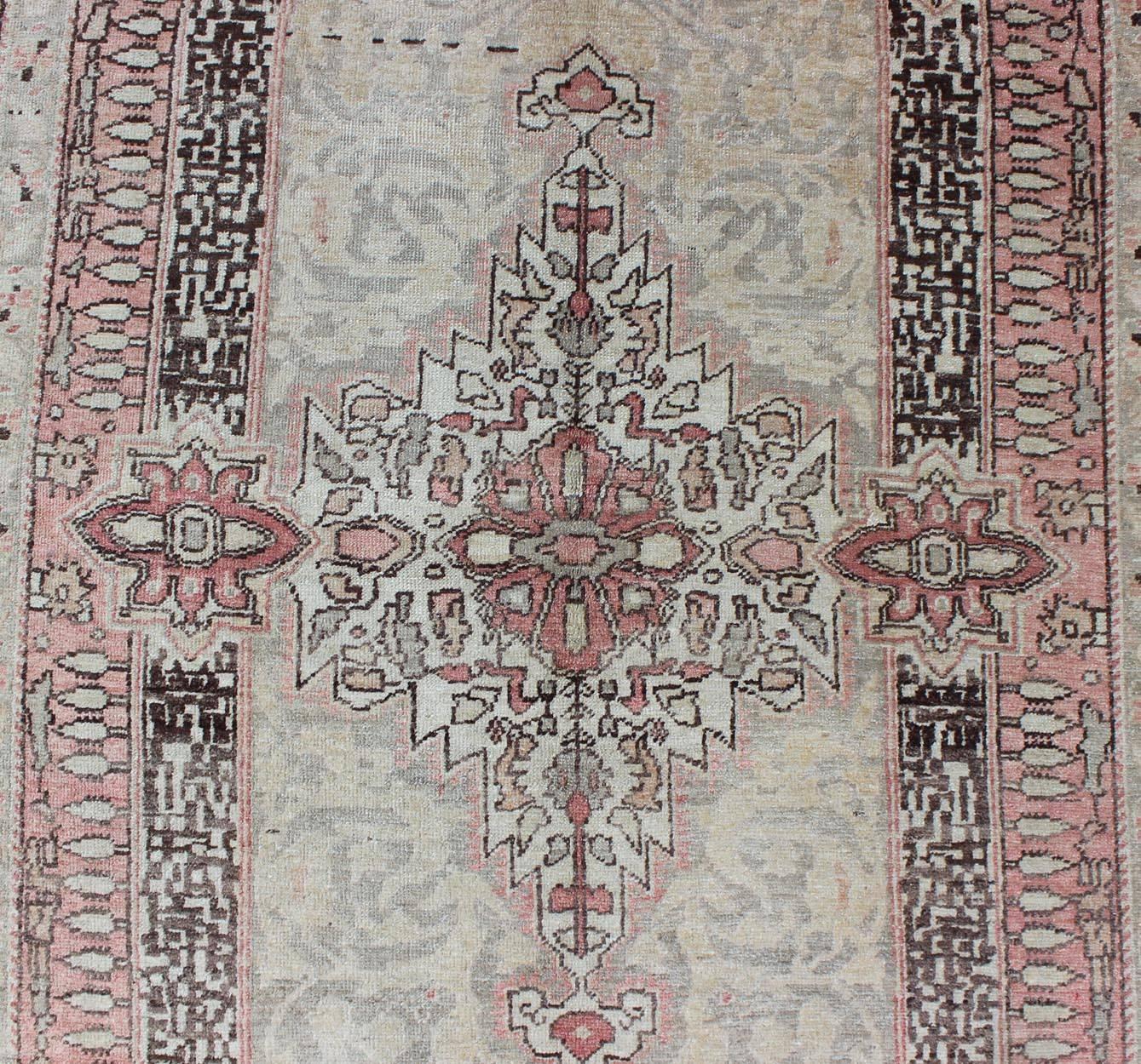 Early 20th century antique Turkish Sivas rug with delicate pink center medallion, rug na-63098, country of origin / type: Turkey / Oushak, circa 1920

This sublime and enchanting antique rug — a gorgeous Sivas rug made in Turkey some time circa turn