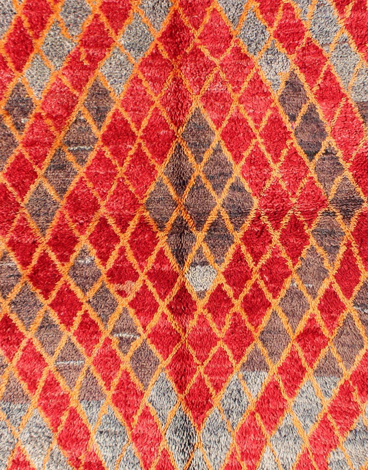 Tribal Midcentury Moroccan Rug with Orange, Red, Brown Diamonds and Blue Fringe Detail For Sale