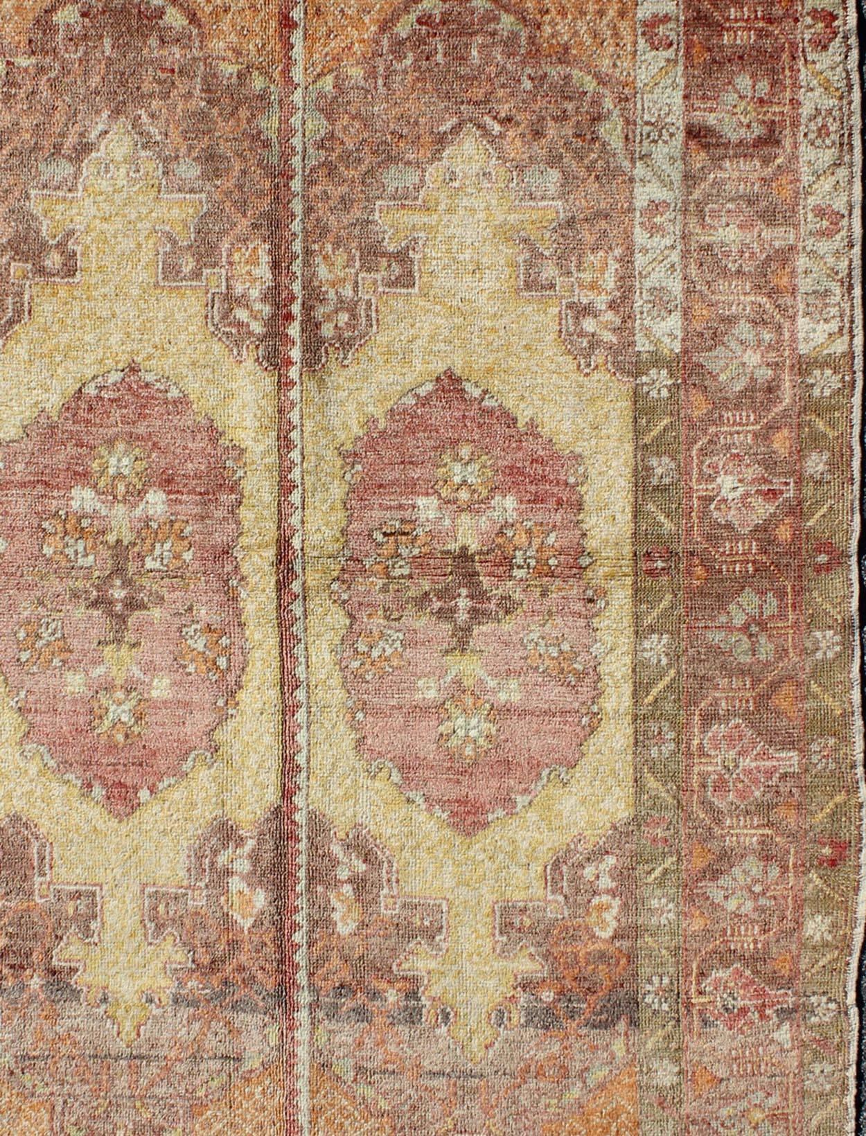 Oushak Rug with Two Medallion Panels in Yellow, Brown, Orange and Soft Red In Good Condition For Sale In Atlanta, GA