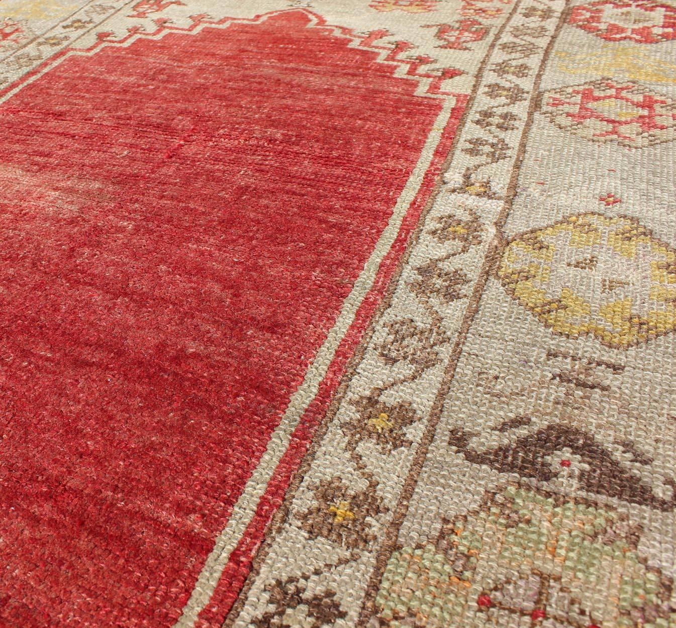 Early 20th Century Antique Turkish Oushak Prayer Rug in Red, Ivory, Green, and Yellow