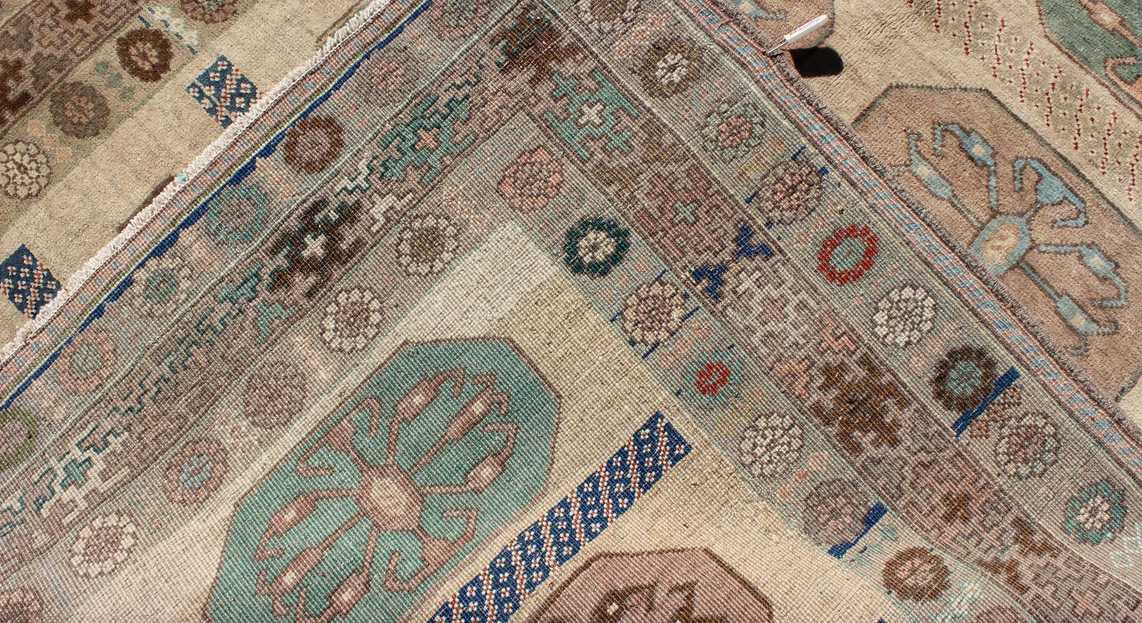 Wool Midcentury Turkish Oushak Rug with Ten Geometric Medallions in Teal and Cream For Sale