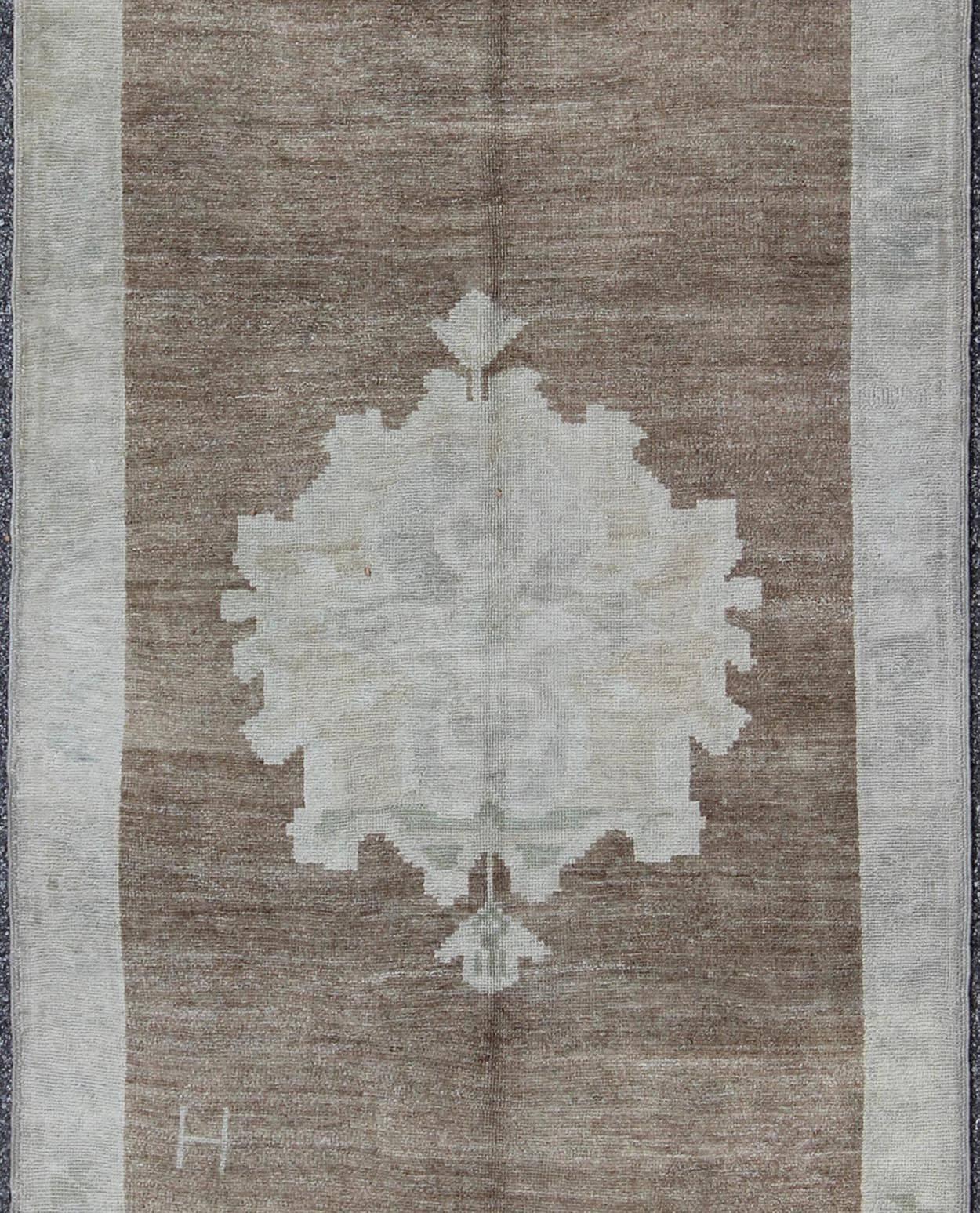 Hand-Knotted Vintage Turkish Oushak Rug with Floral Cornices in Light Brown, Gray and Cream For Sale