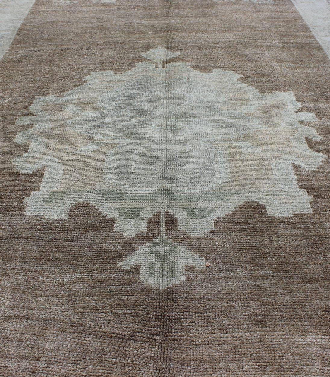 Wool Vintage Turkish Oushak Rug with Floral Cornices in Light Brown, Gray and Cream For Sale
