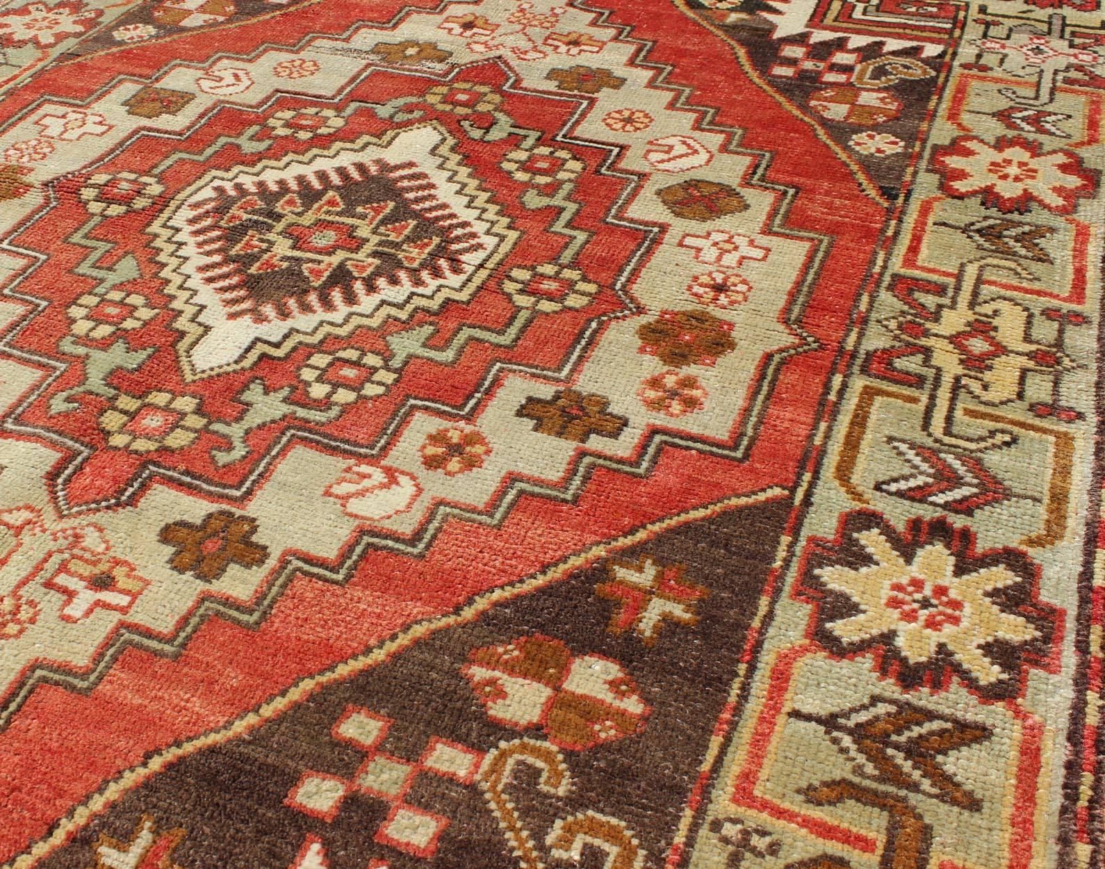 Multi-Layered Medallion Vintage Turkish Oushak Rug in Red, Brown, Mint Green In Excellent Condition For Sale In Atlanta, GA